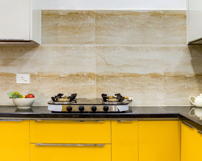 WarmToned Kitchen Tile Design With A Patterned Dado Livspace