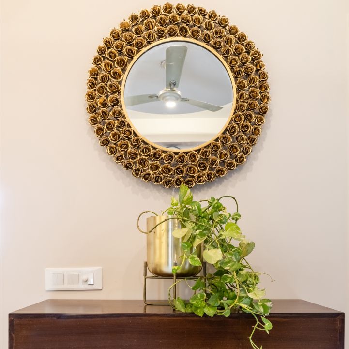 Modern Beige Wall Paint Design With A Framed Mirror