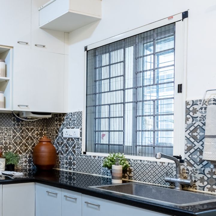 Kitchen Window Design With Black Grills | Livspace