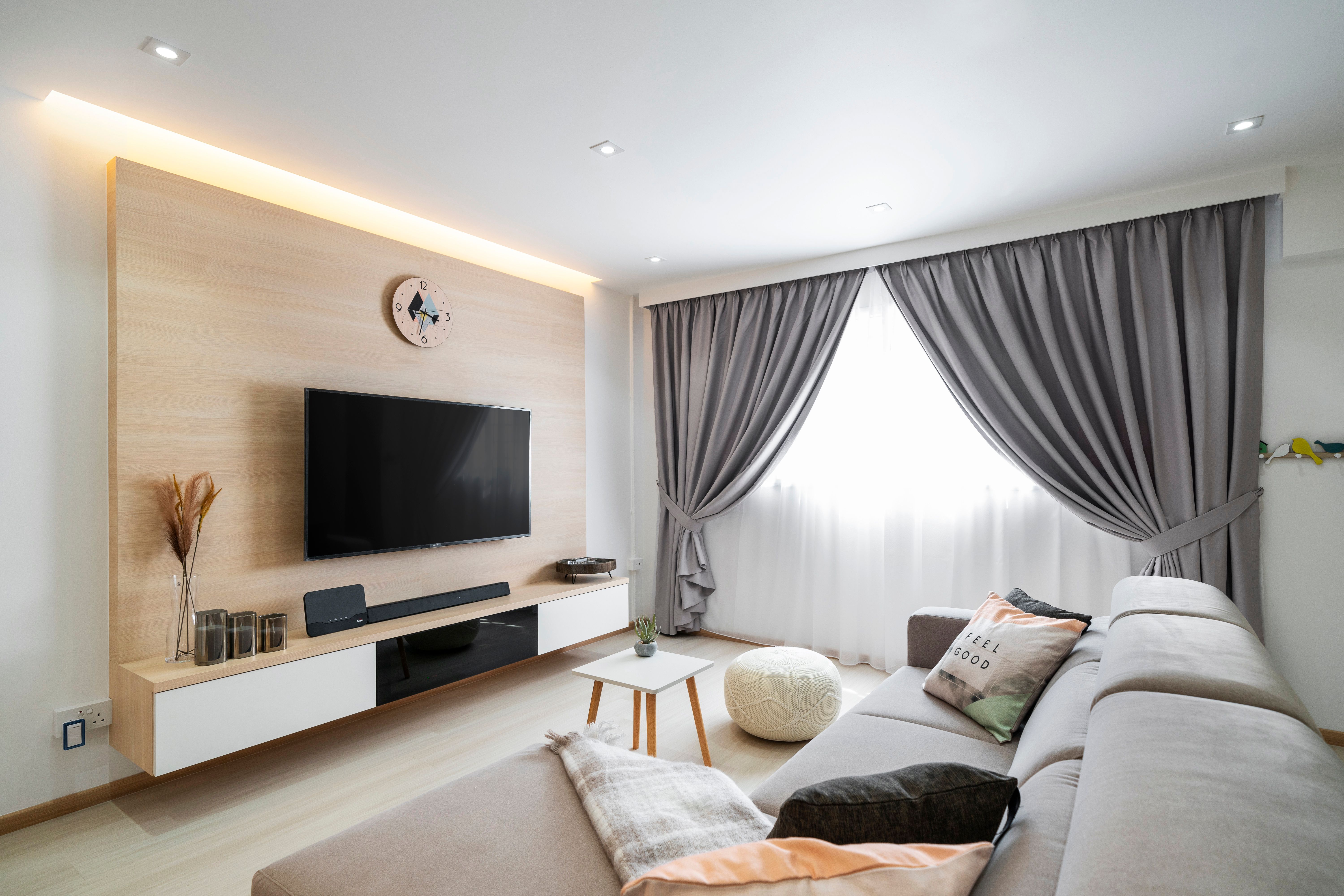 Minimalist Interior Design With Wall-Mounted TV Unit And Beige Sofa