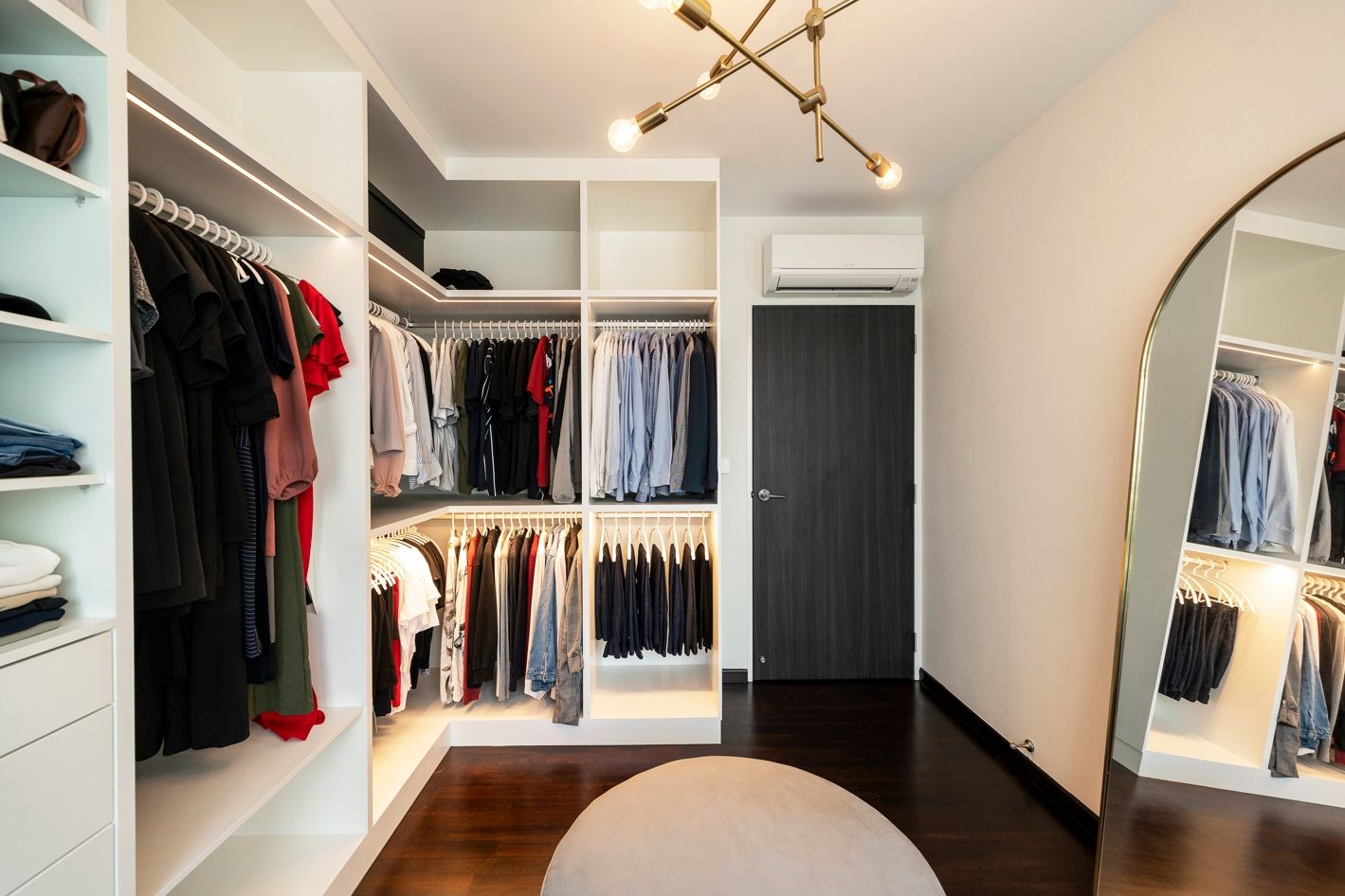 LShaped Dressing Room Wardrobe Design With Profile Lights Livspace