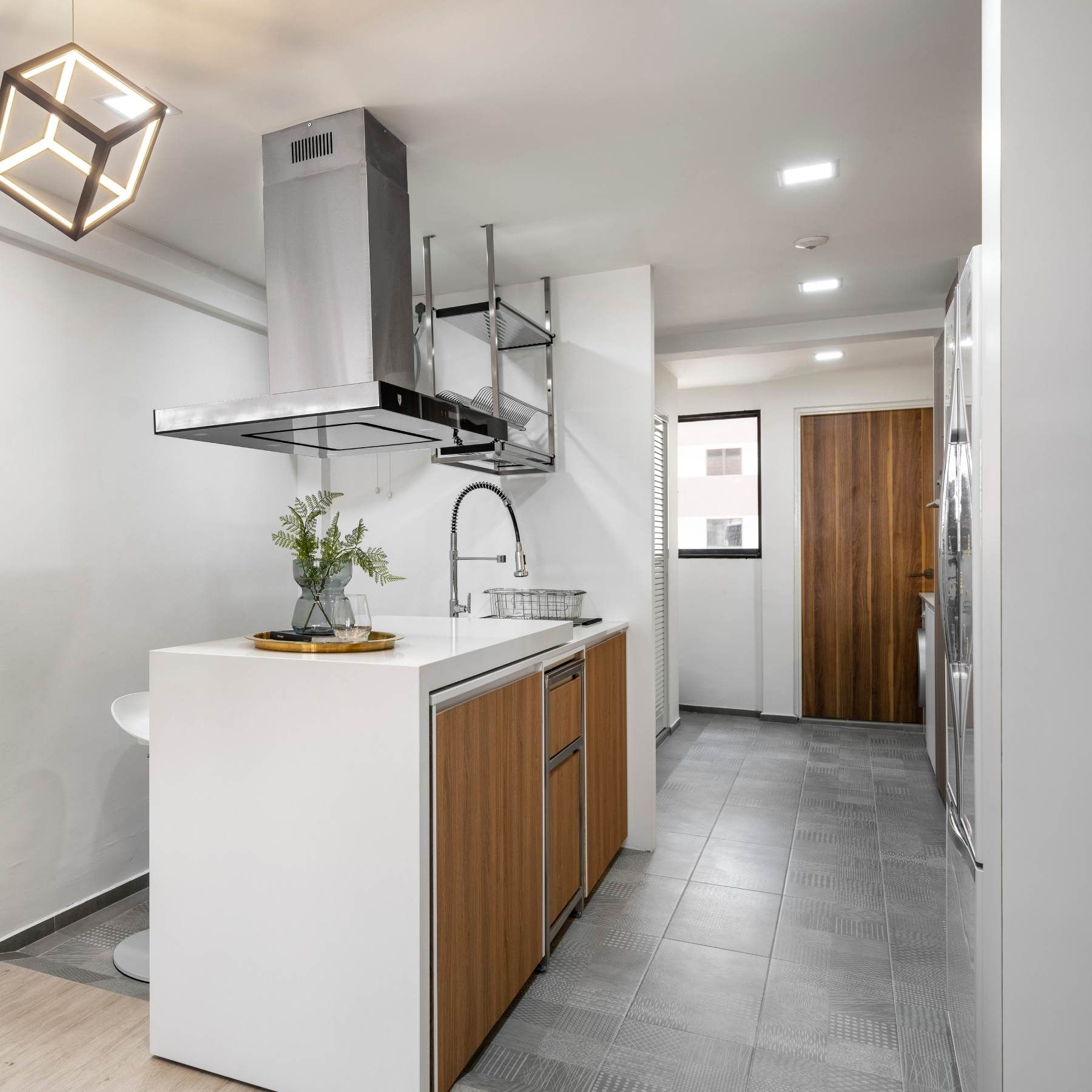 Minimal Laminate Design For Kitchen With A Subtle Colour Palette