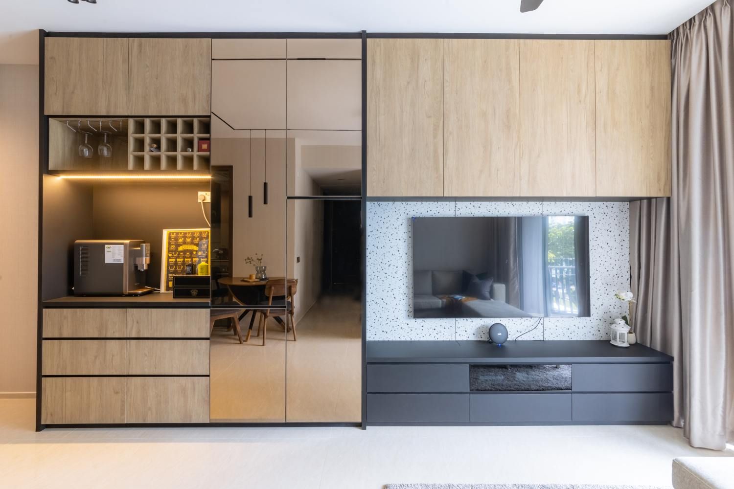 WallMounted TV Design With White Terrazo Tiles For The Back