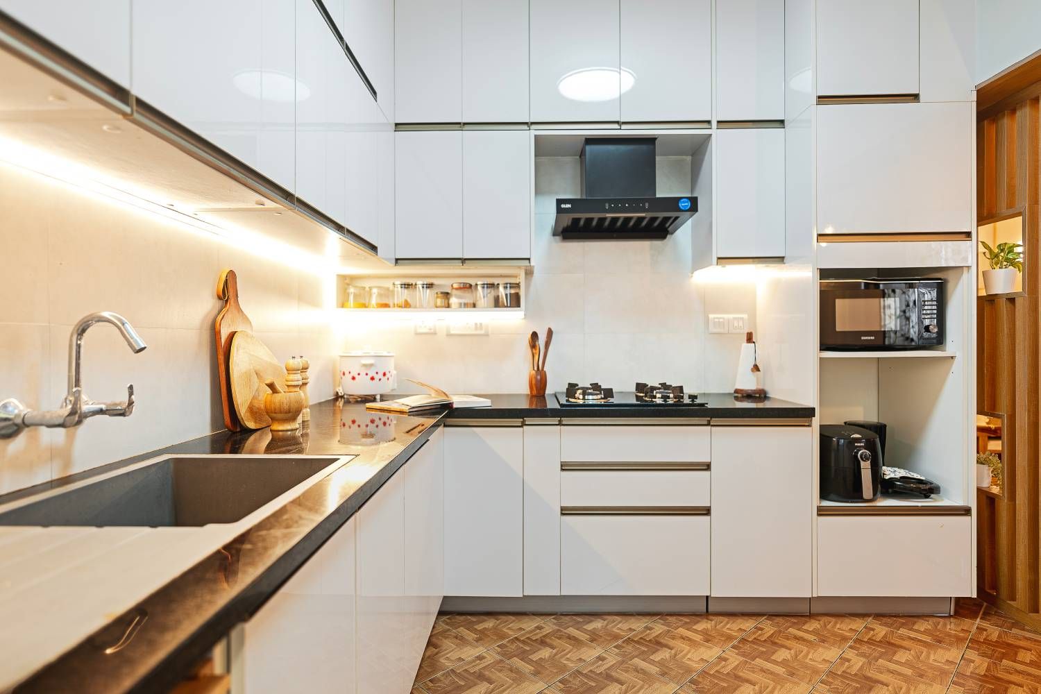 L-Shaped Kitchen Design with White Units and Under Cabinet Lighting