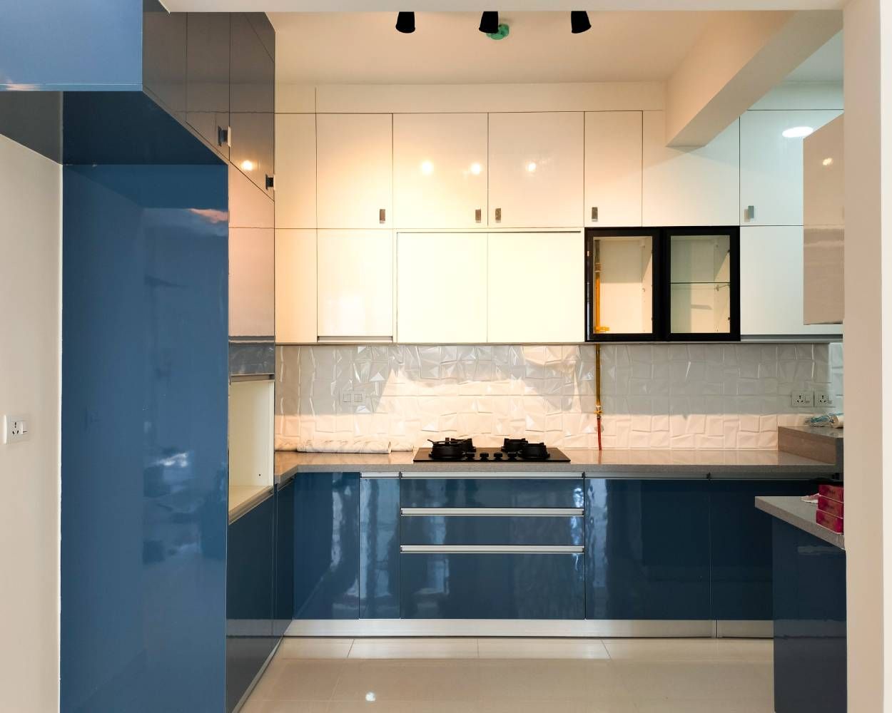 U-Shaped Kitchen Design with Cream and Navy Blue Cabinets