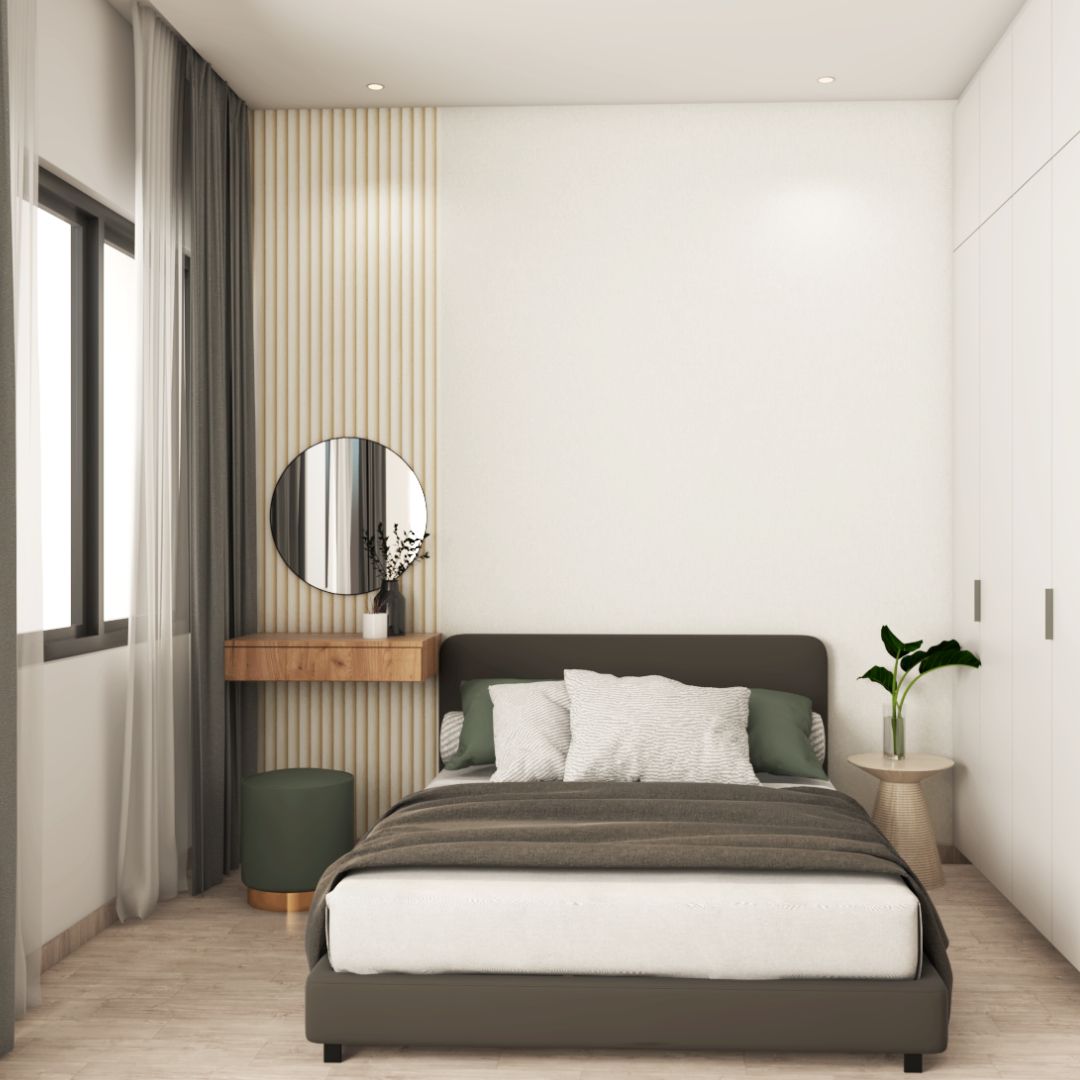 Modern Bedroom Design With Grey Upholstered Bed And A Green Ottoman Stool