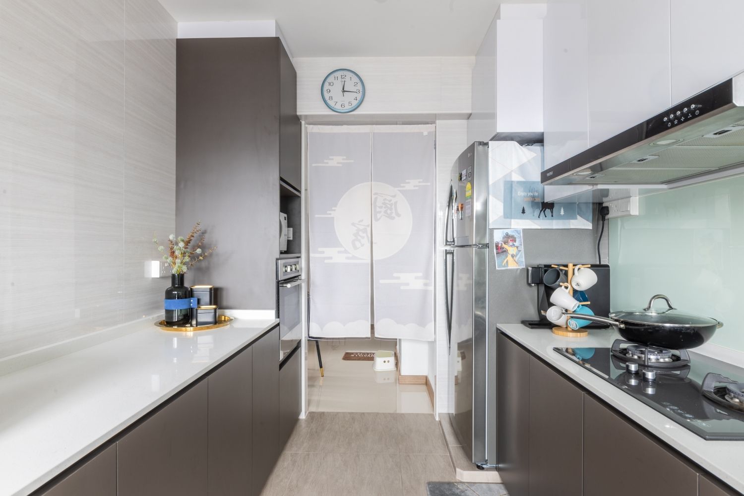 Dark-Coloured Kitchen Interior Design With Spacious Storage Cabinets ...