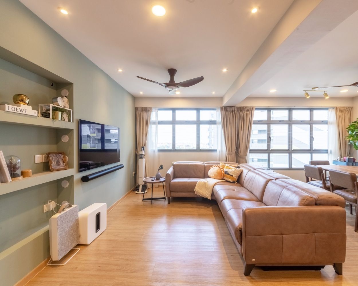 Spacious Living Room Design With A Wooden Side Table | Livspace