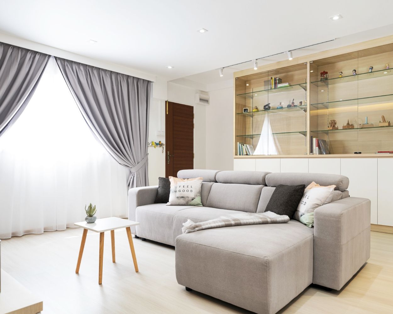 Living Room Design With A Grey LShaped Sofa Livspace