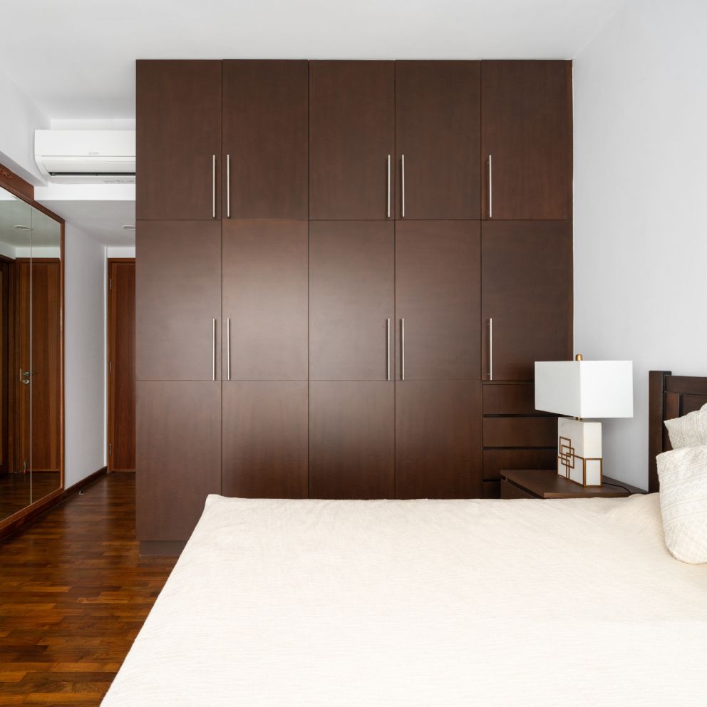 Spacious Dark Wooden Wardrobe Design Livspace
