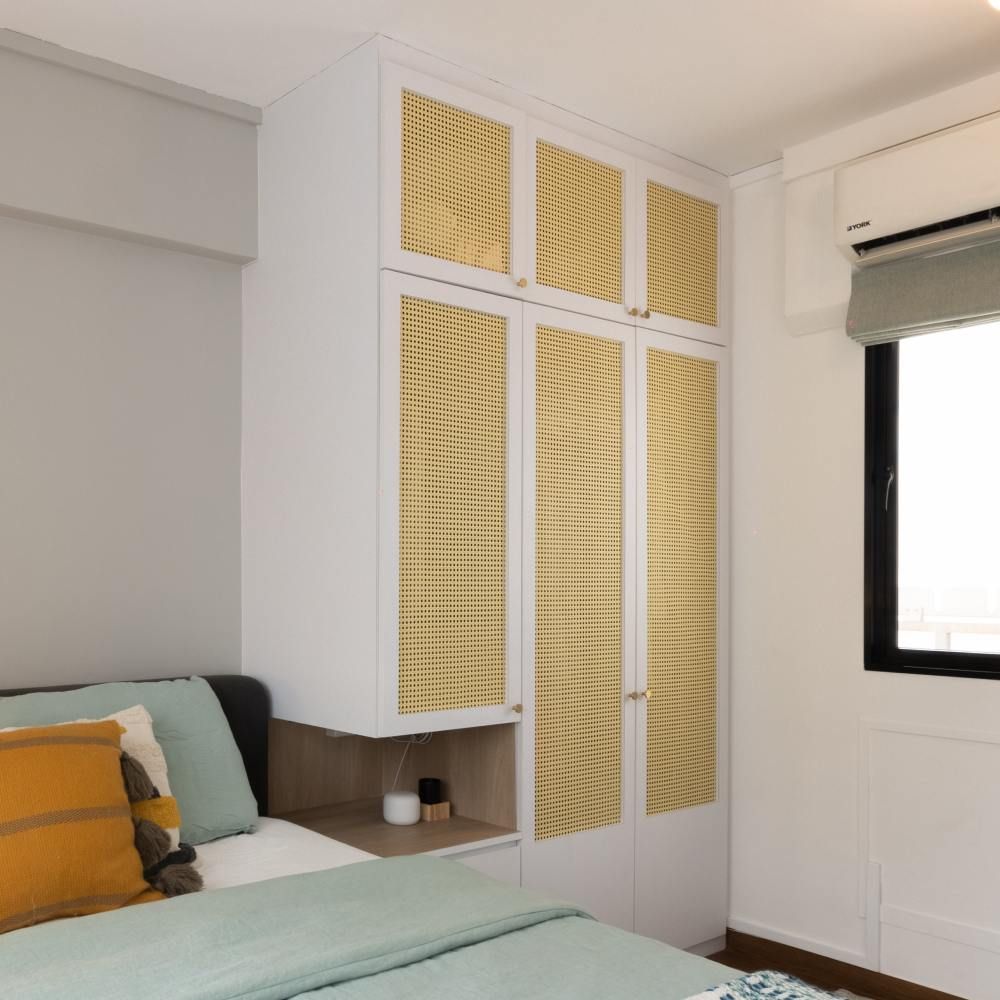 Compact Wardrobe Design With Rattan Shutters Livspace