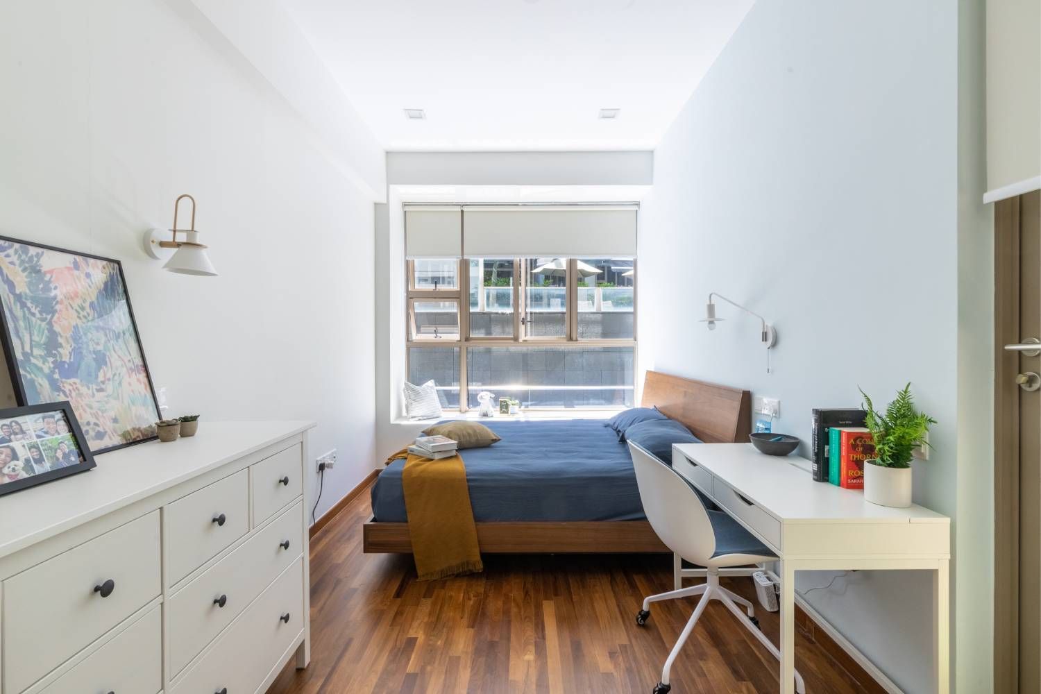 Contemporary Master Bedroom with Wooden Bed And White Study Table