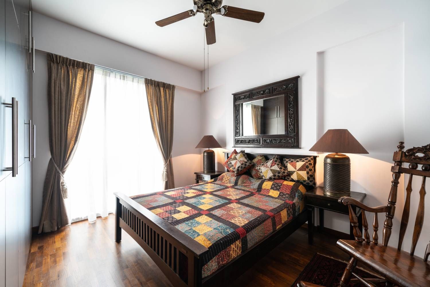 Contemporary Master Bedroom Design with Wooden Bed and Multicolored Upholstery