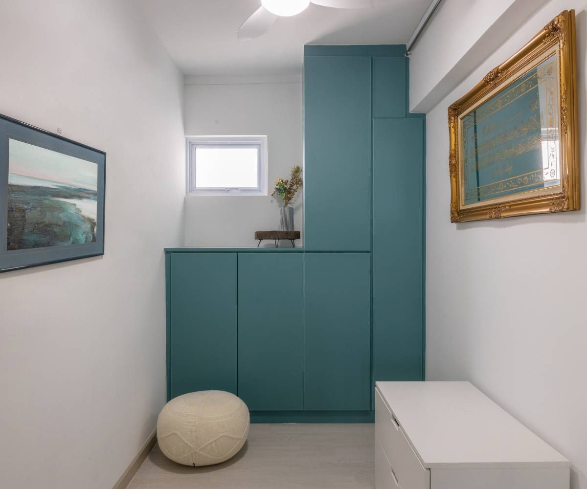 Contemporary Turquoise And White Foyer Design With Storage Units