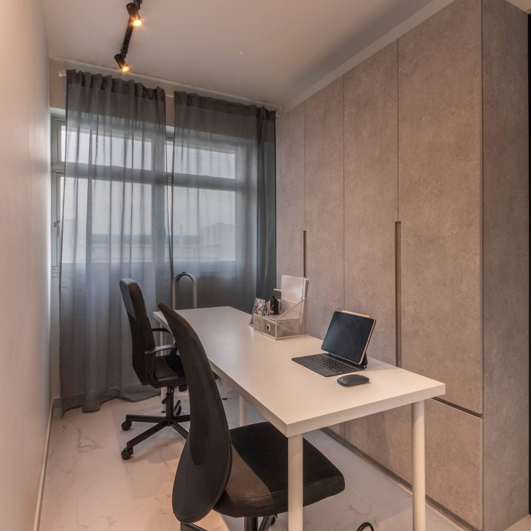 Modern White And Grey Home Office Design With Two Black Swivel Chairs