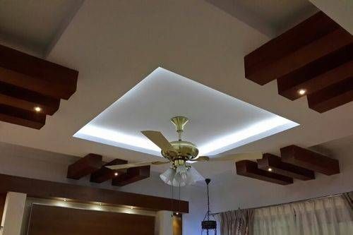 Contemporary Gypsum Ceiling Design With Wooden Panels