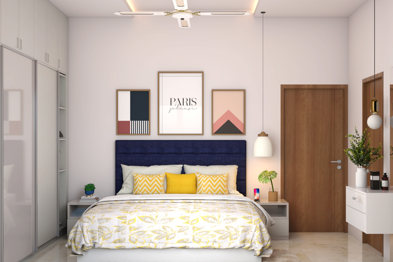 Master Bedroom With Bright Yellow Accents And Dark Blue Tufted ...