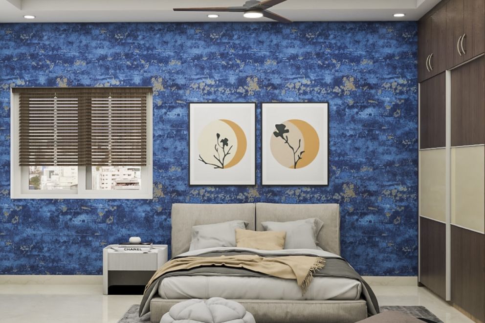 Contemporary Guest Room Design With A King Size Bed And Blue Textured Wall