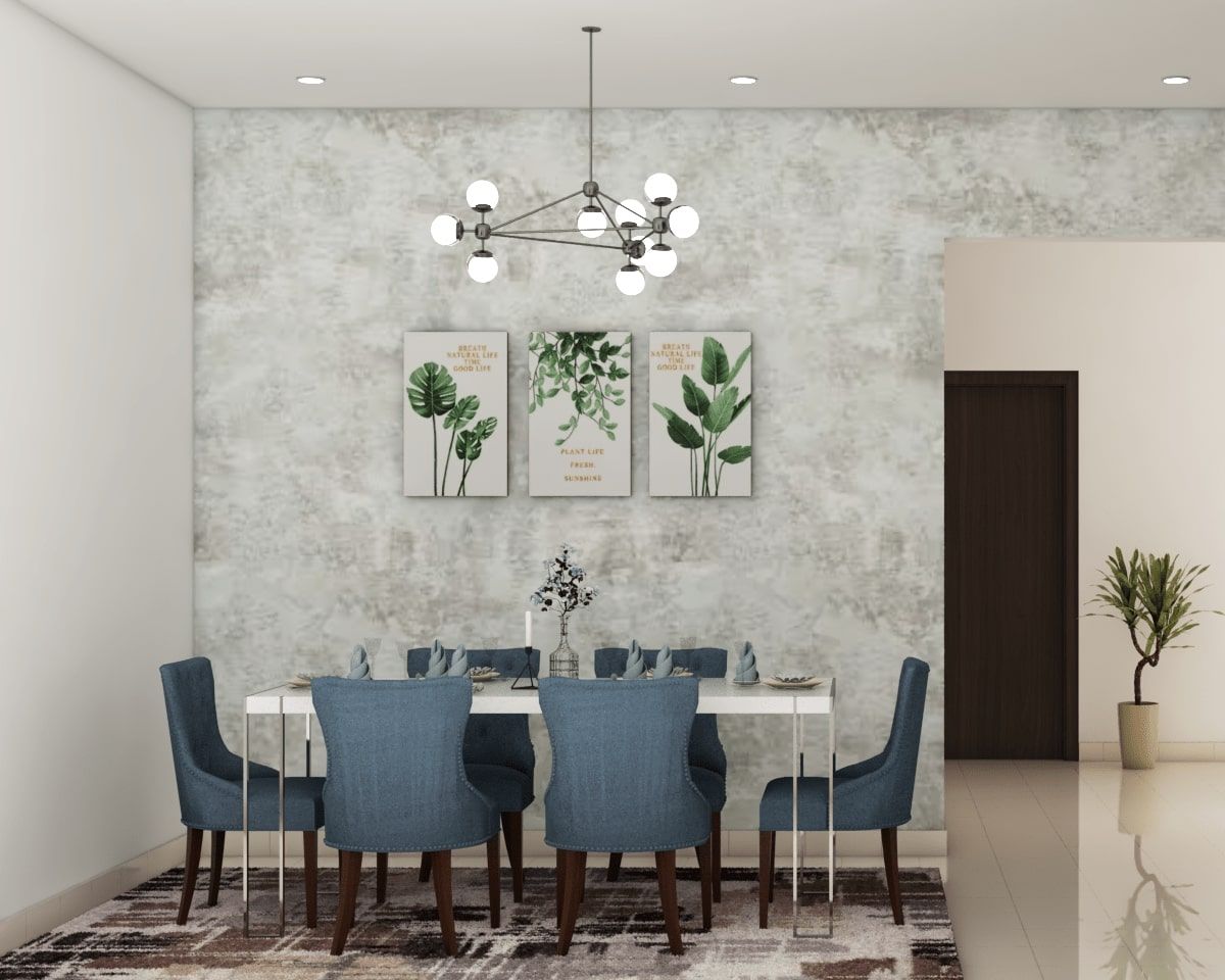 Spacious Dining Room Design With Wall Paintings | Livspace