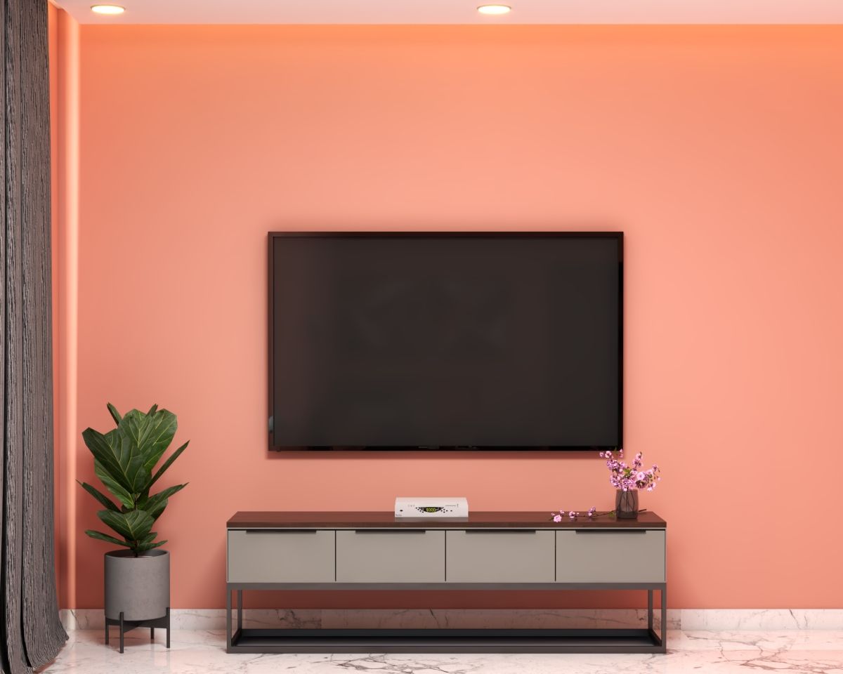 Simple TV Unit Design With Pink Wall Paint | Livspace
