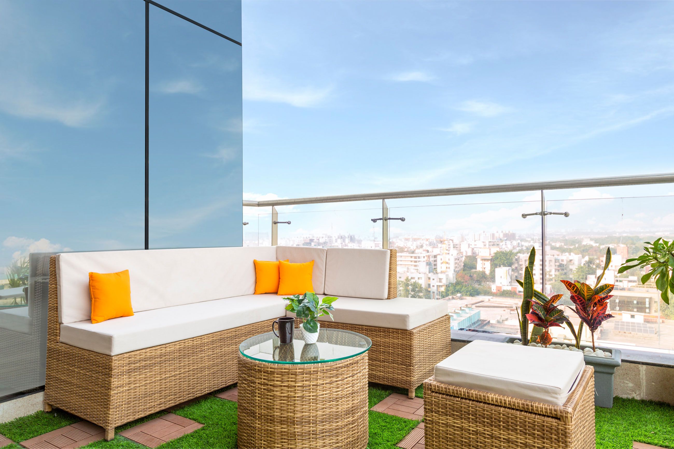 Modern Balcony Design with Glass Wall and Stylish Furniture