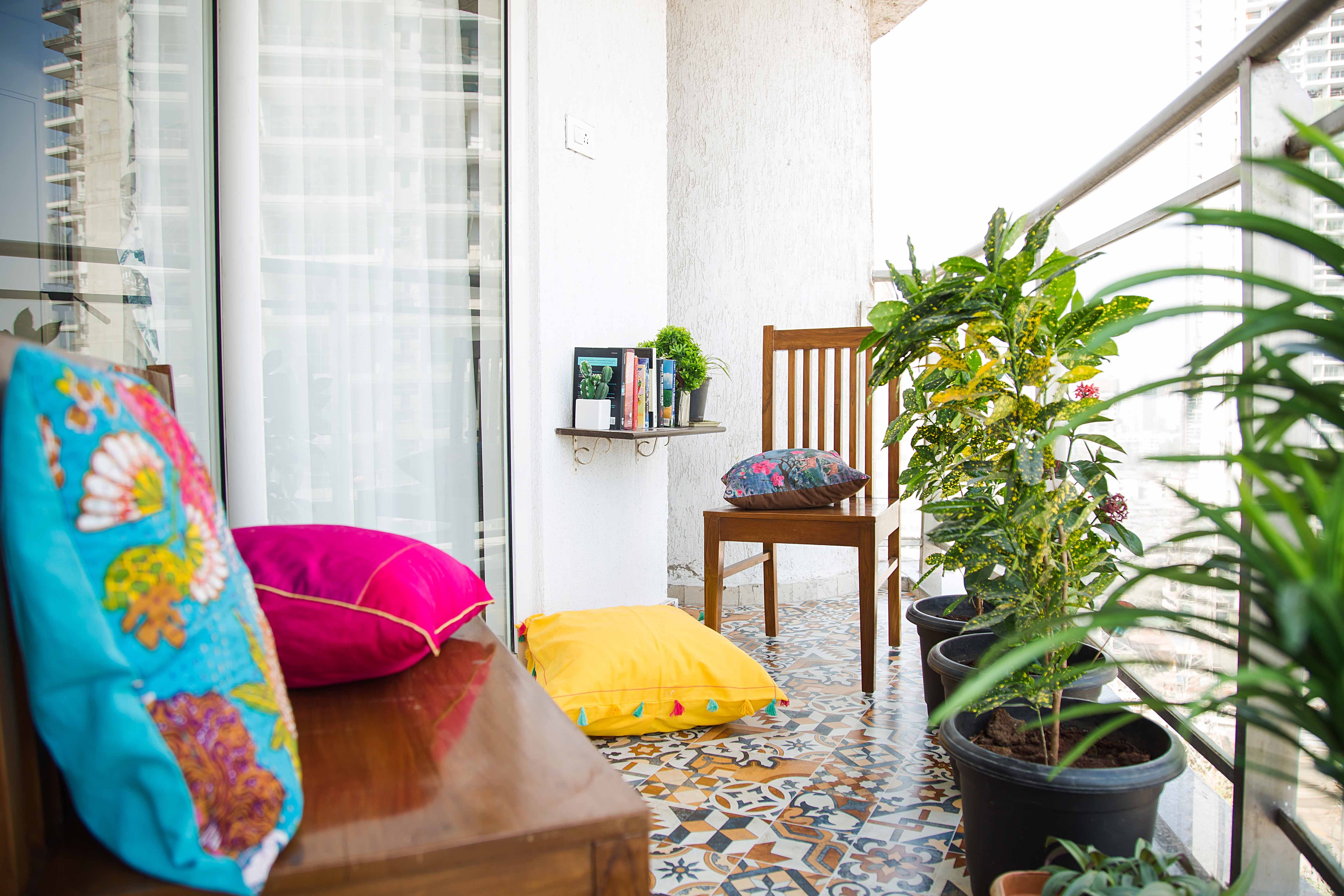 Eclectic Balcony Design with Textured Off-White Wall and Moroccan Floor Tiling