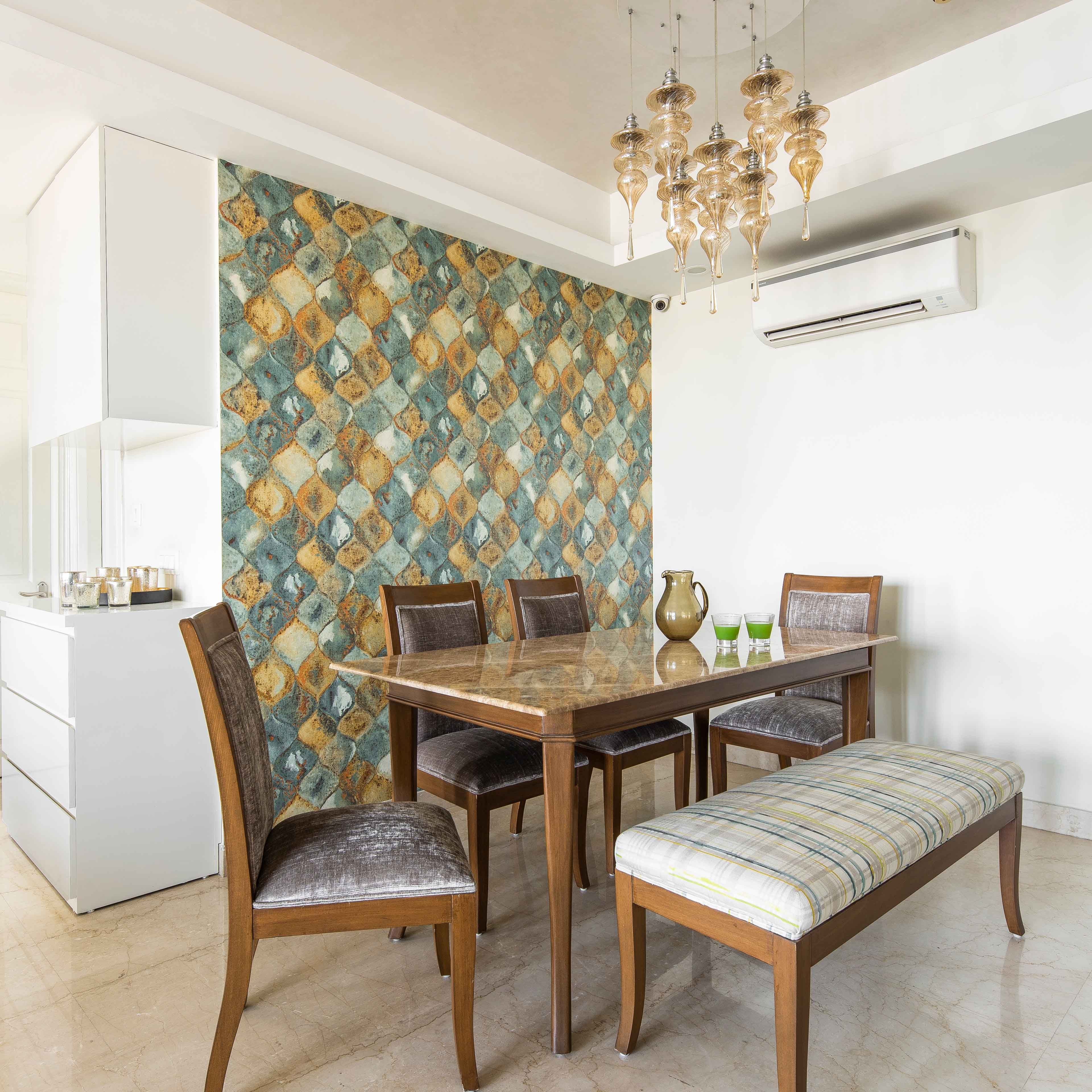 Modern 4-Seater Brown Dining Room Design With Grey Velvet Chairs And Abstract Multicoloured Wallpaper