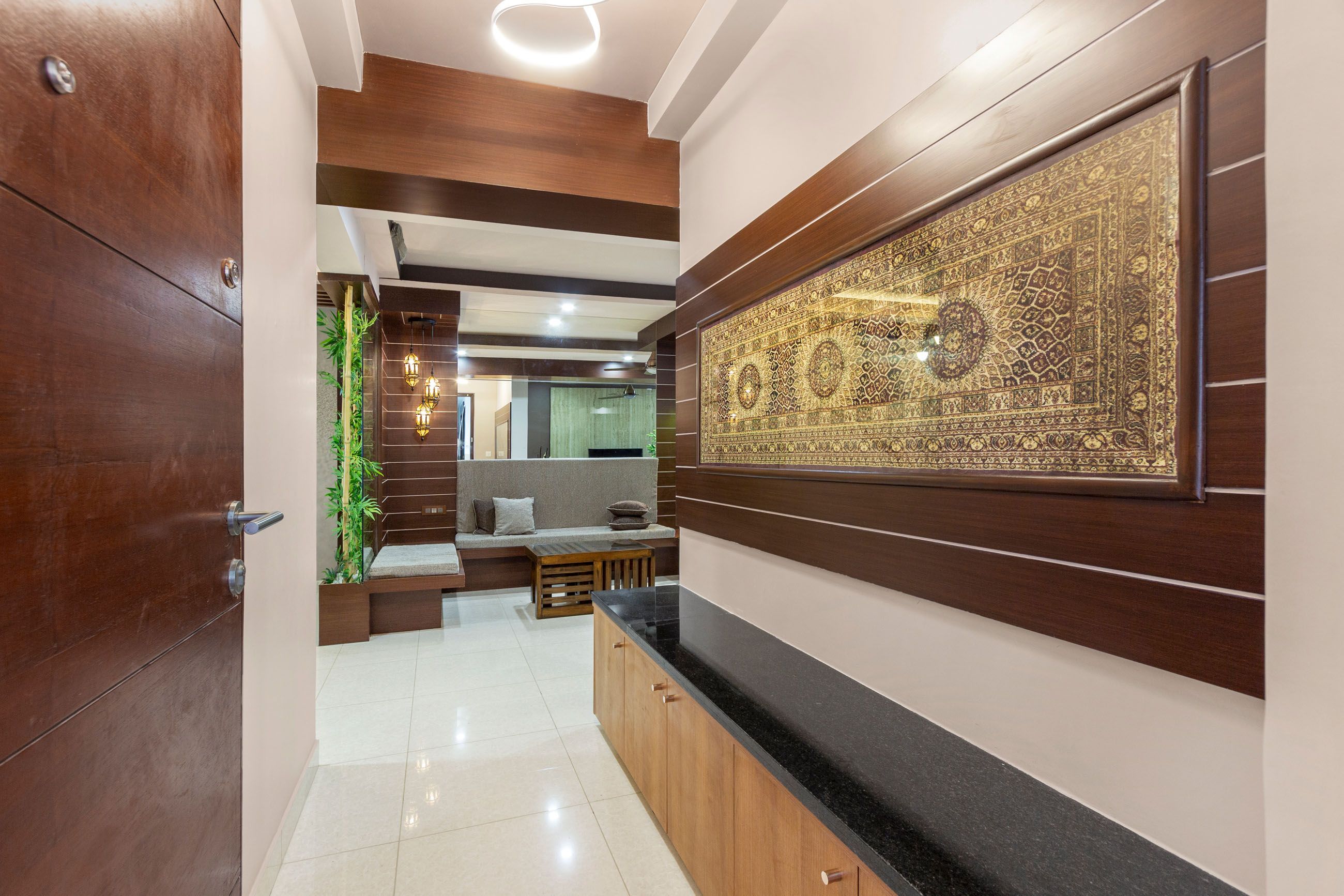 Contemporary Walnut Bronze Foyer Design With Horizontal Wooden Panels