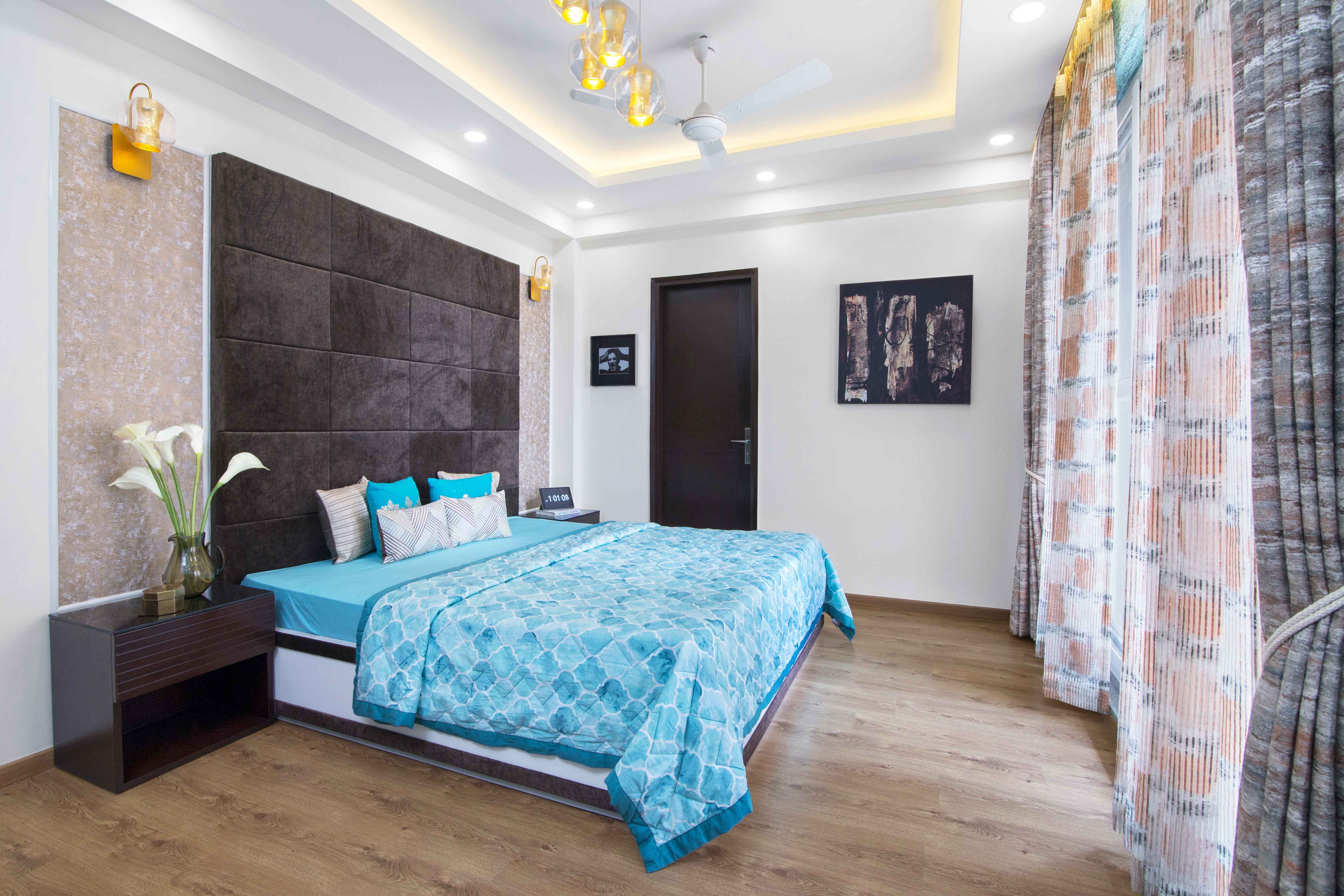 Modern Guest Room Design With Long Brown Headboard And Rectangular False Ceiling