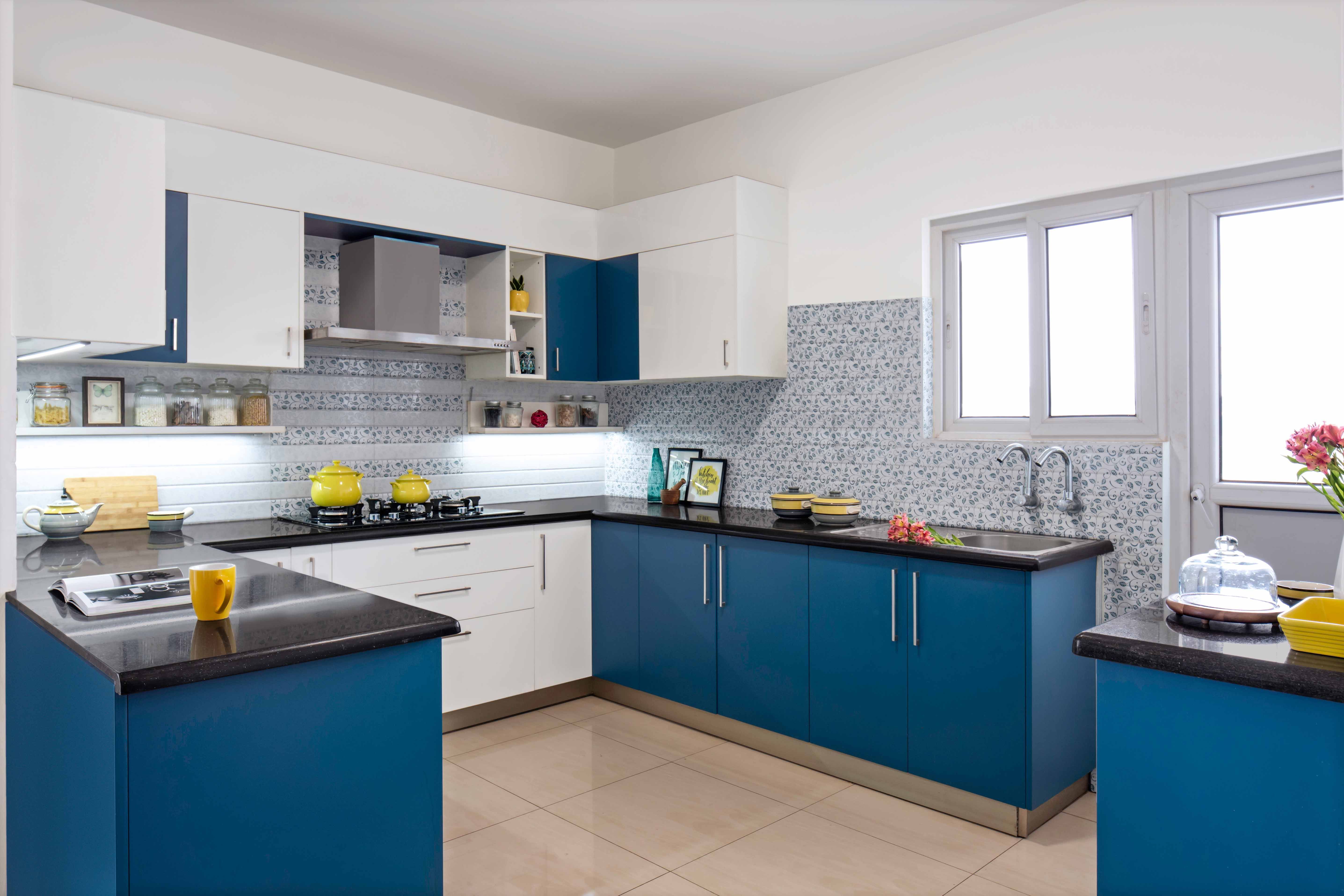 Contemporary 2-BHK Flat In Bangalore With Blue And White U-Shaped Kitchen