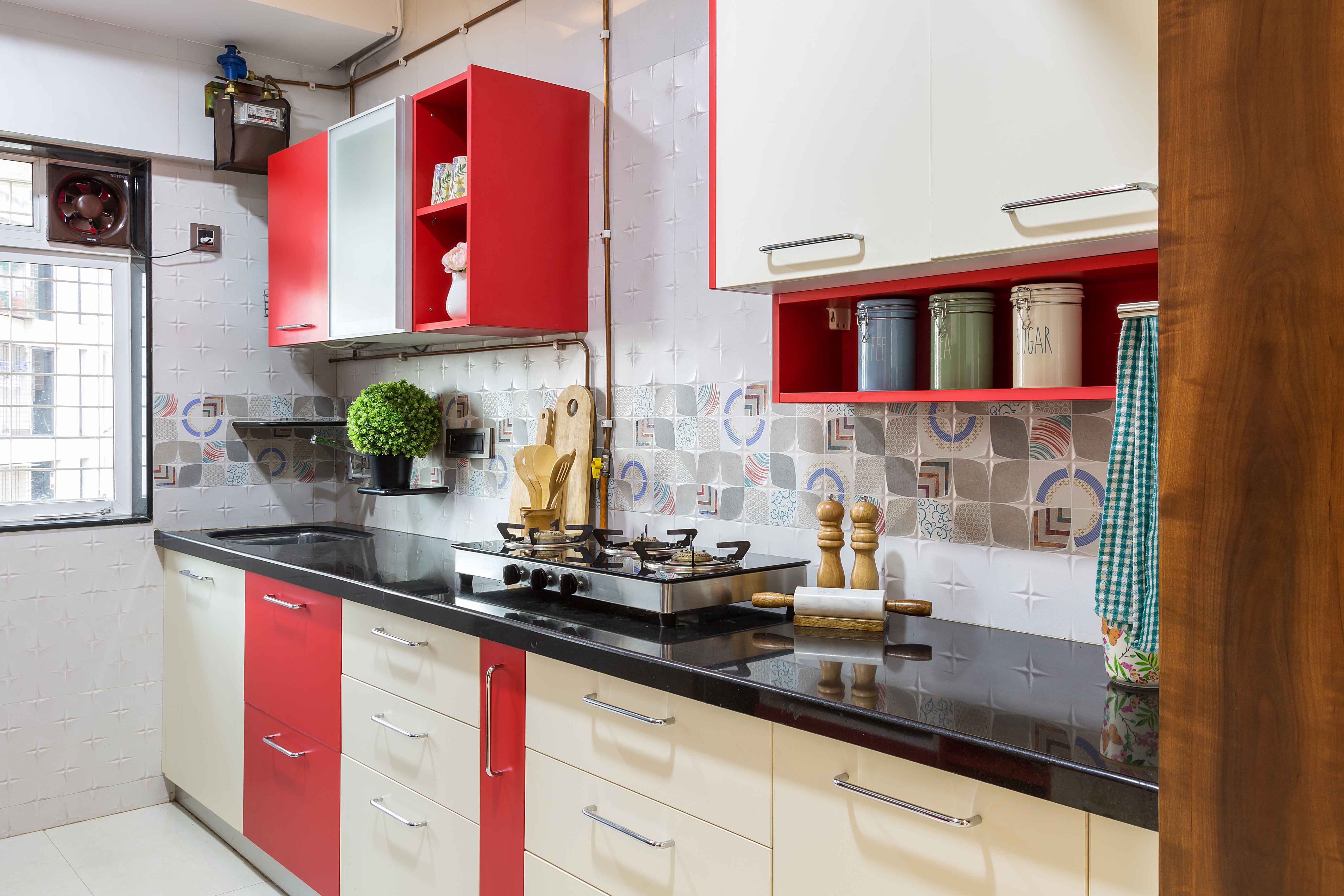 Contemporary 3-BHK Flat In Mumbai With Red And White Straight Kitchen Design