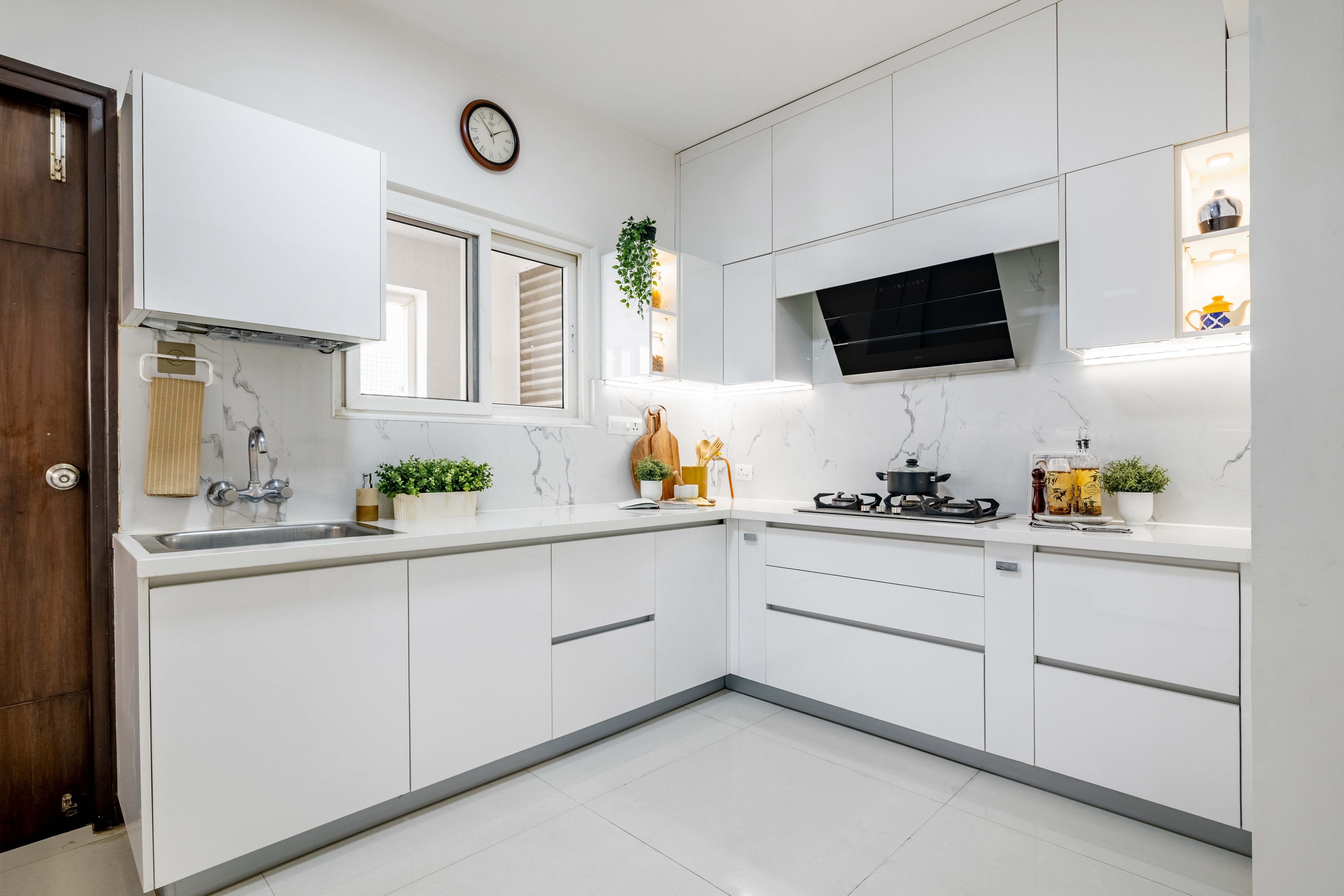Contemporary L-Shaped Kitchen Design with Frosty White Cabinets