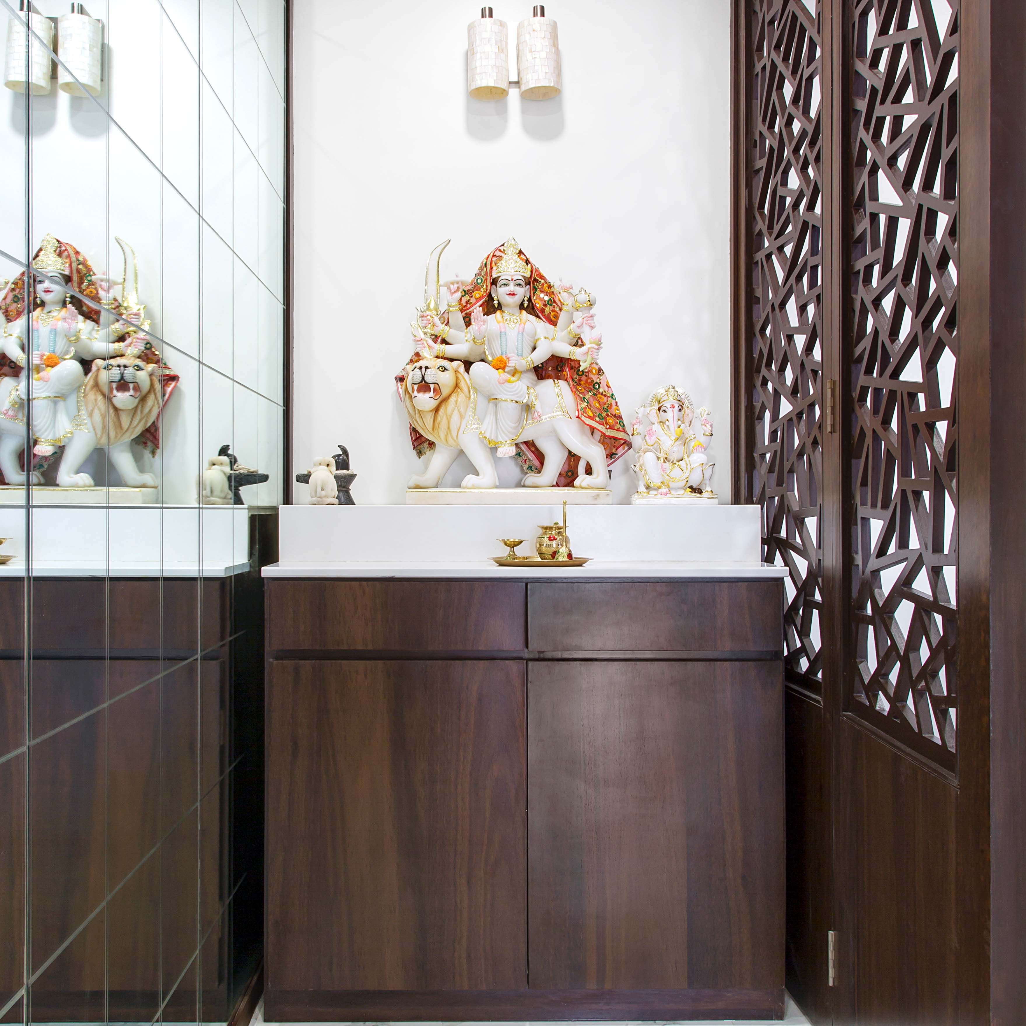 Minimal Wooden Pooja Unit Design With Mirrored Side Wall