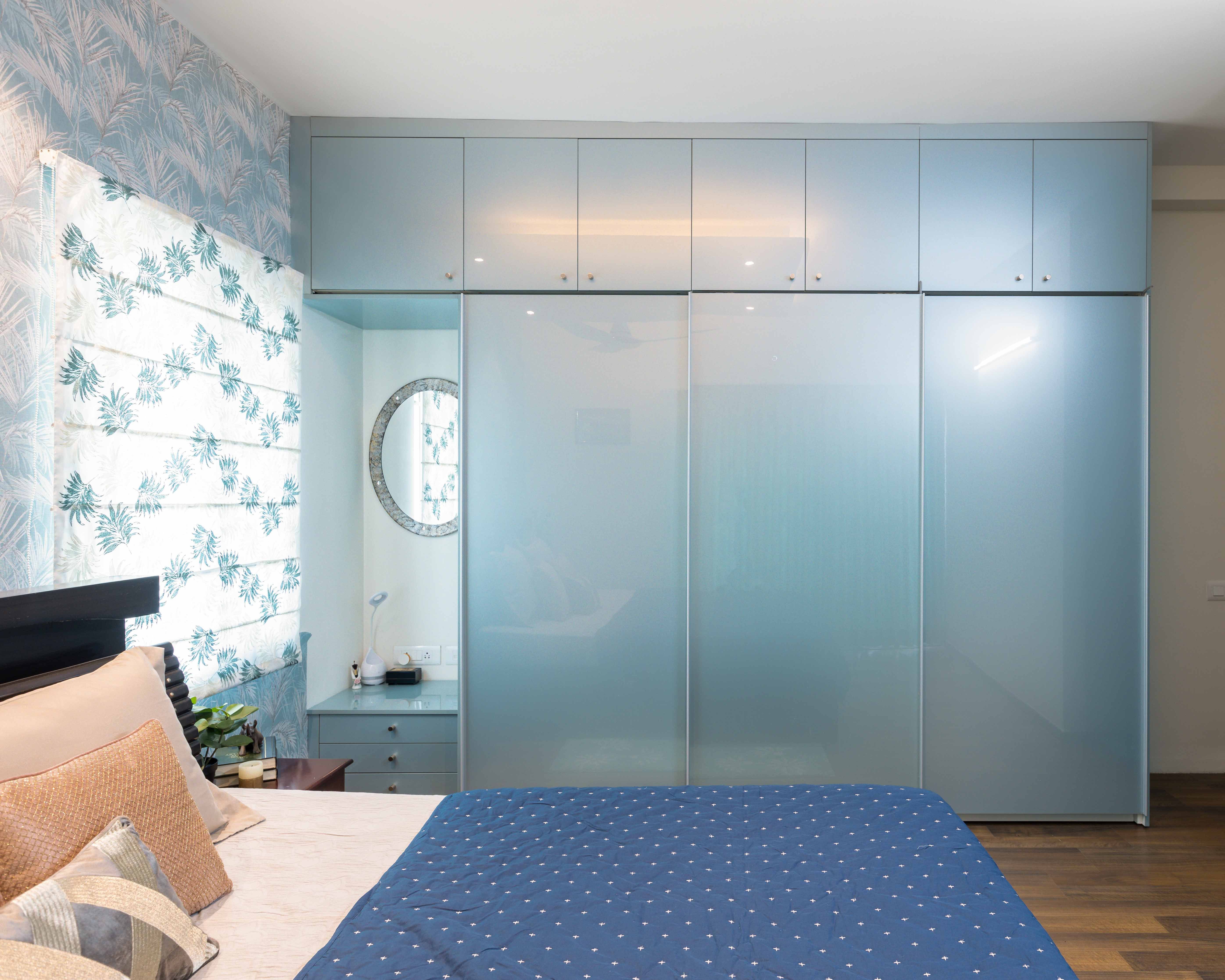 Modern Blue Danube Sliding Door Wardrobe Design and Loft with Glossy Laminate Finish