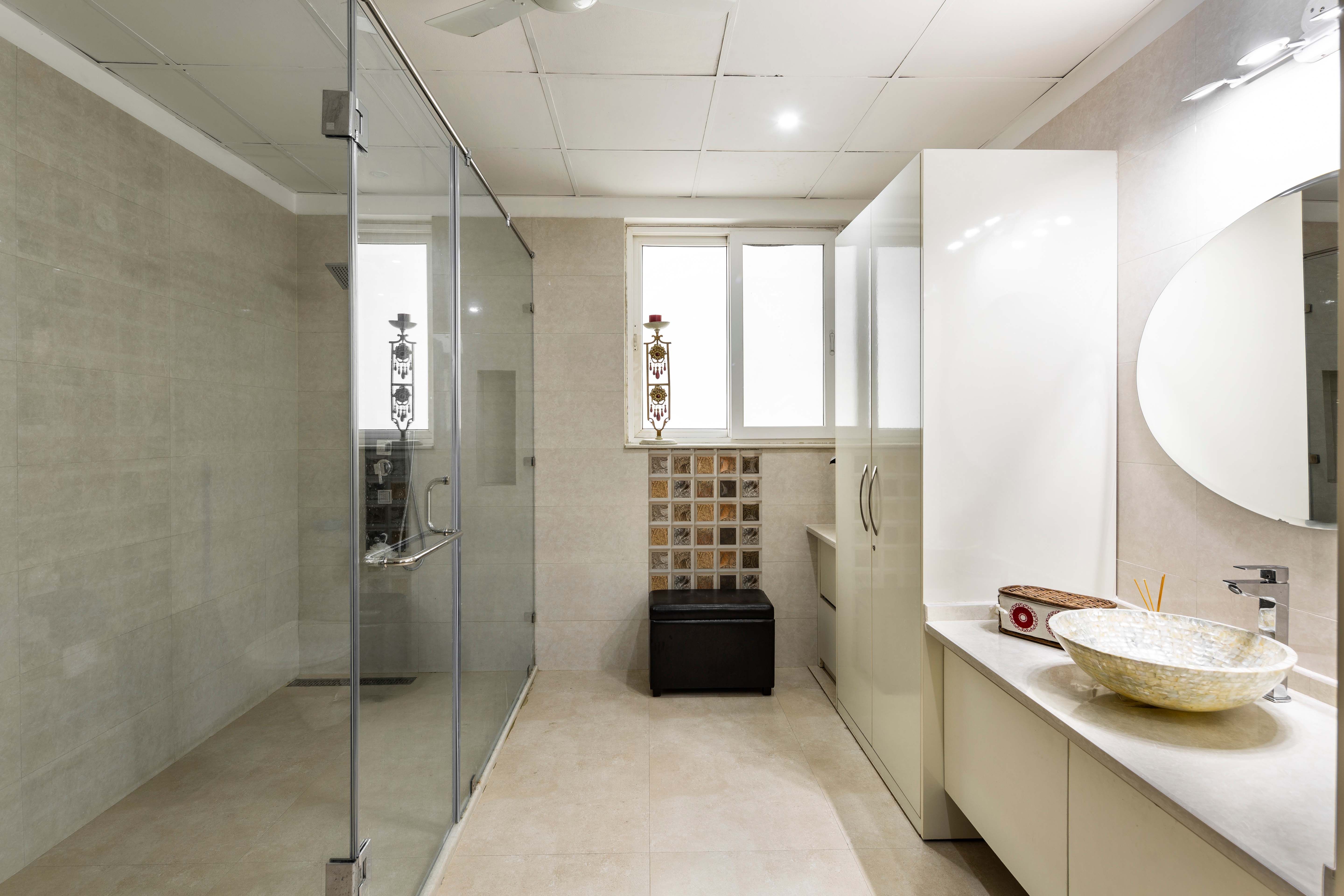 Spacious Bathroom Design With A Separate Shower Area | Livspace