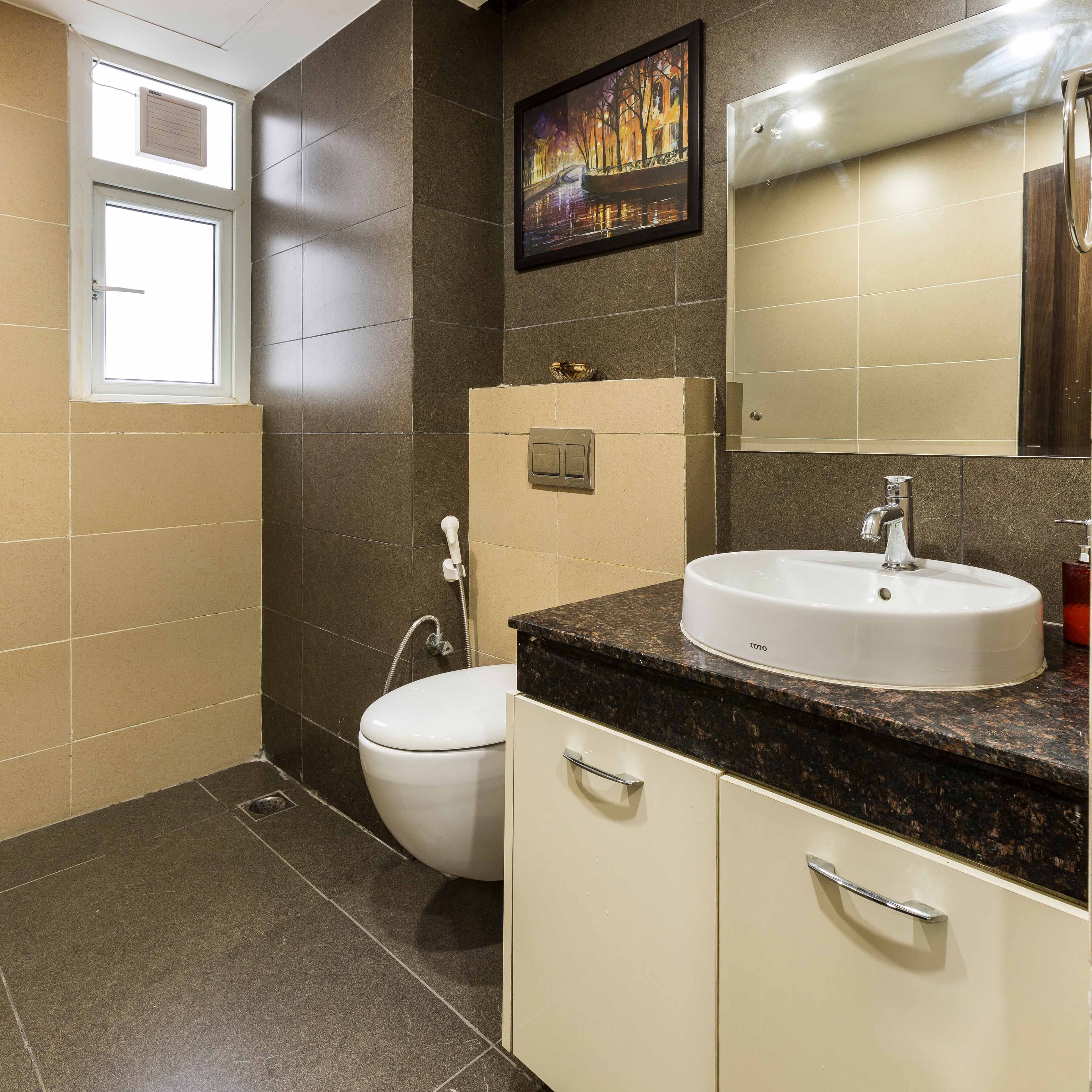 Warm-Toned Bathroom Design With A Wall Paintings | Livspace