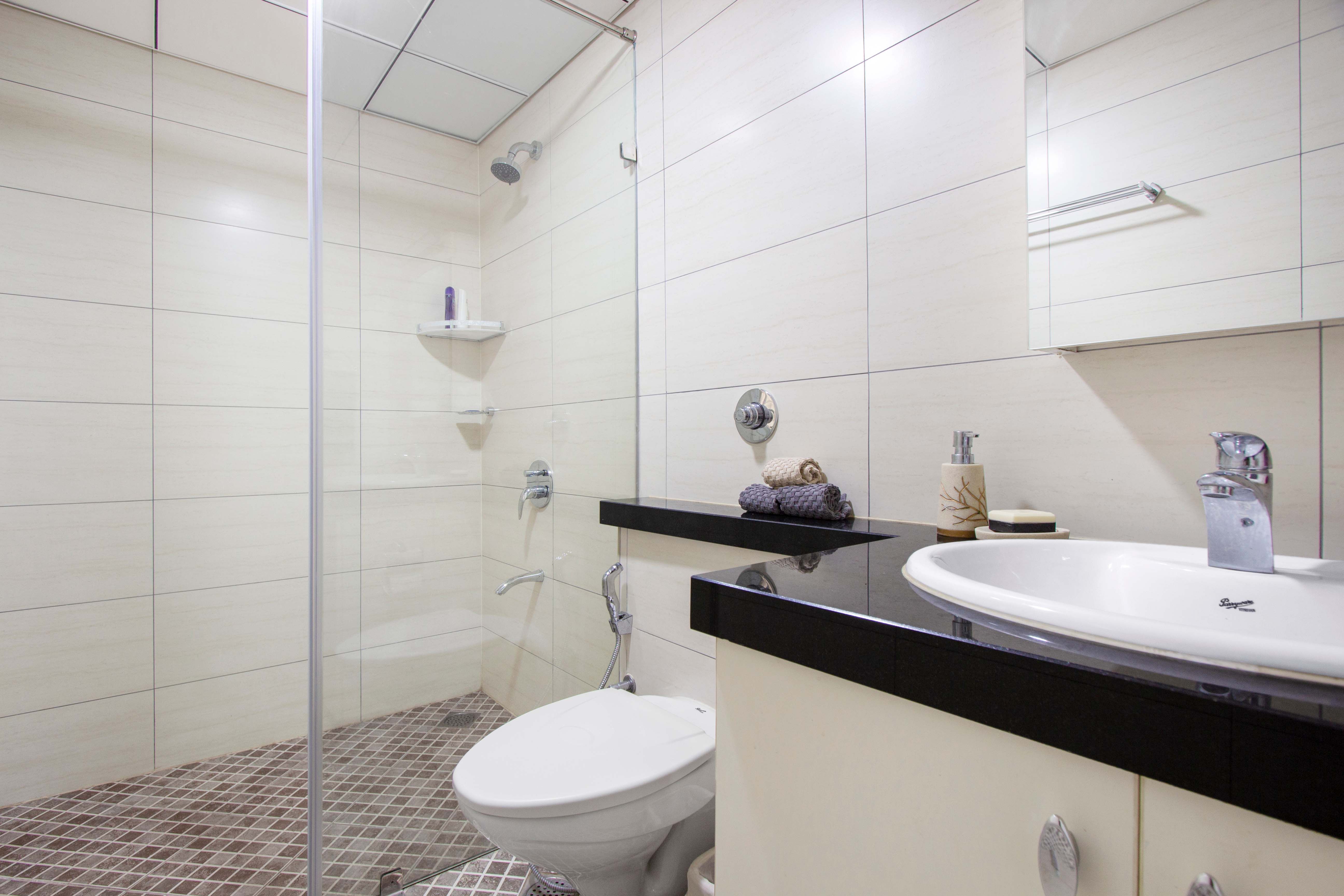 Modern White Bathroom Design With A Shower Area