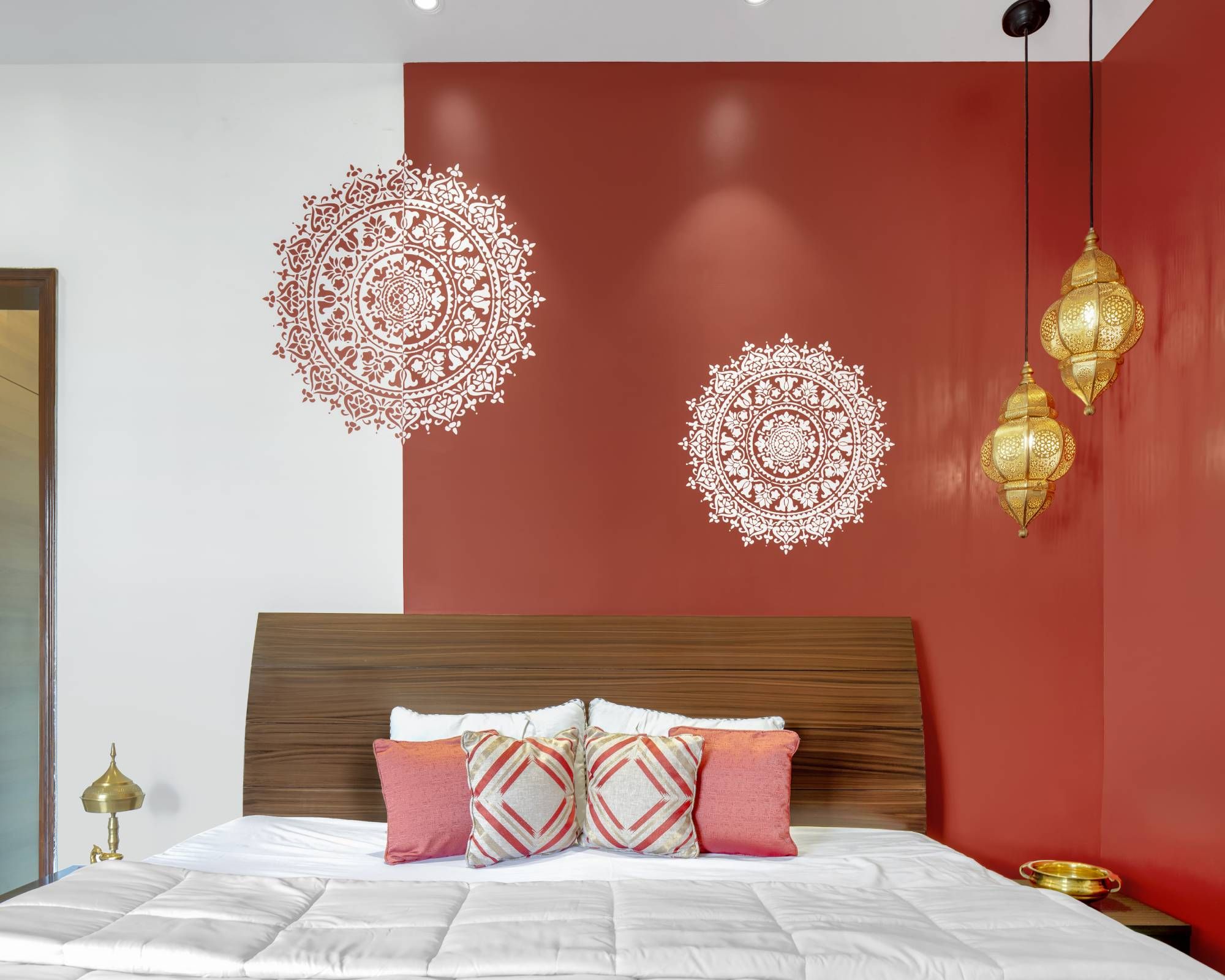 Modern Guest Room Design With Red And White Wall With Mandala Design