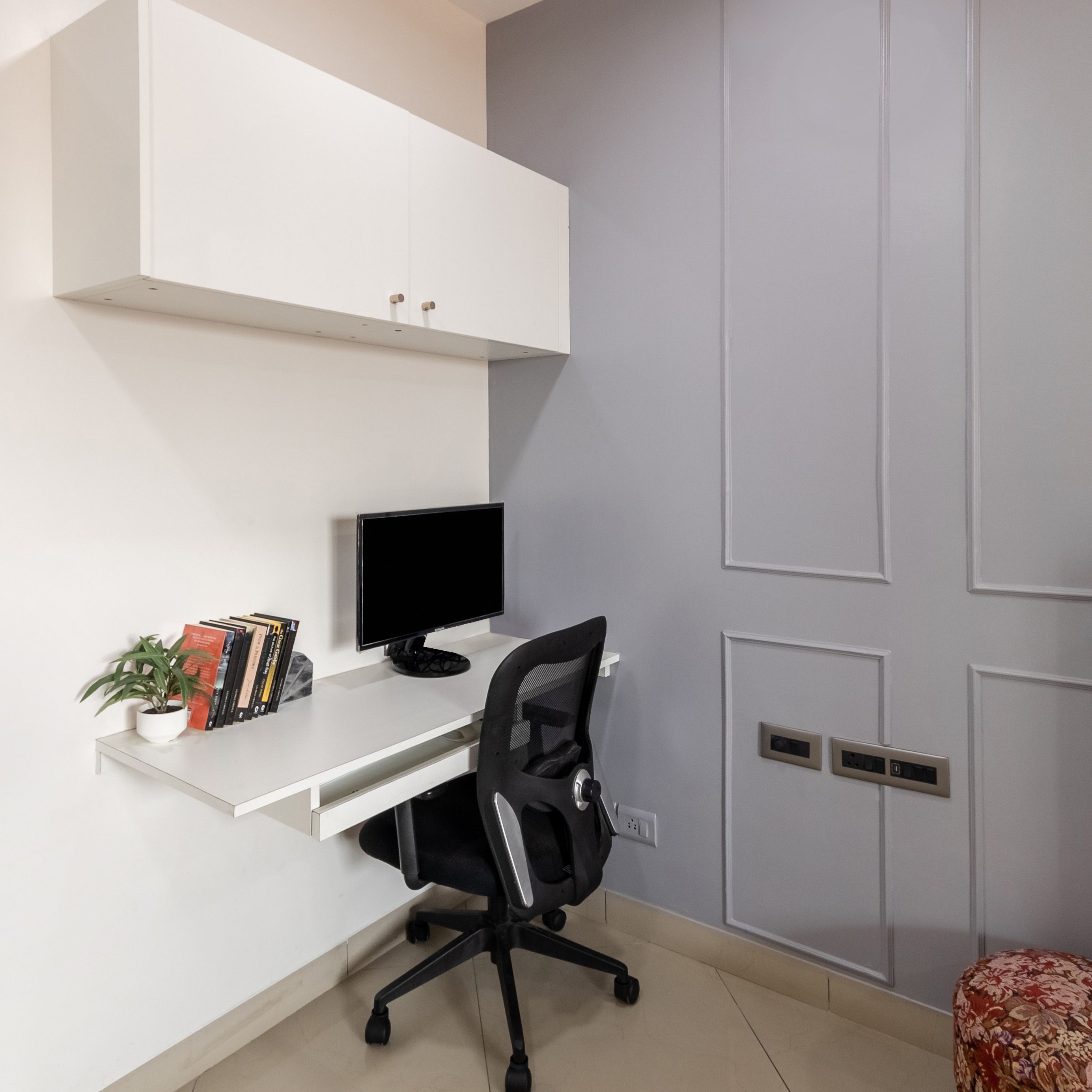 Modern White Home Office Design With A Wall-Mounted Table