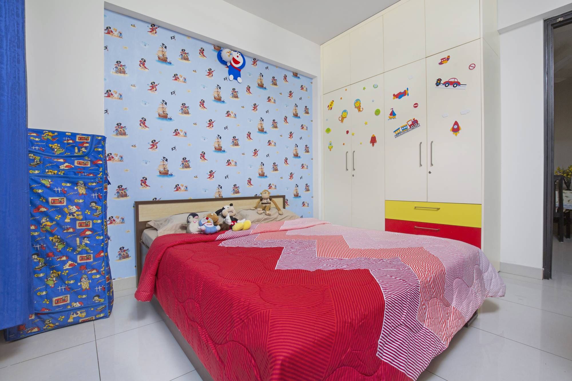 Modern Kids Bedroom Design With A Double Bed And Light Blue Wallpaper