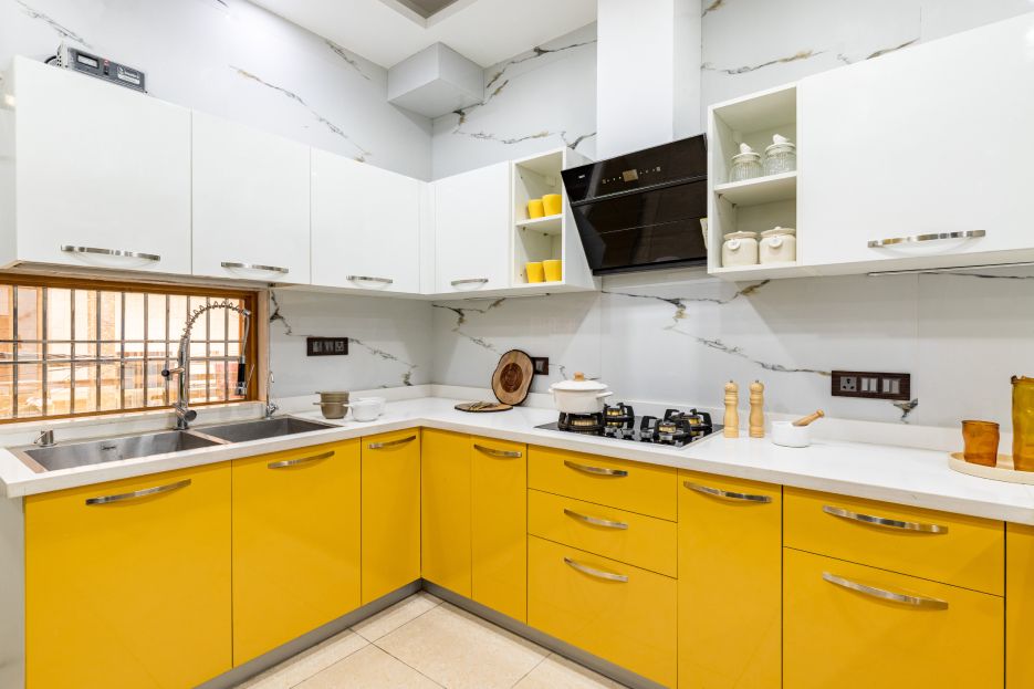 Modern U-Shaped Kitchen Design With Yellow And White Cabinets