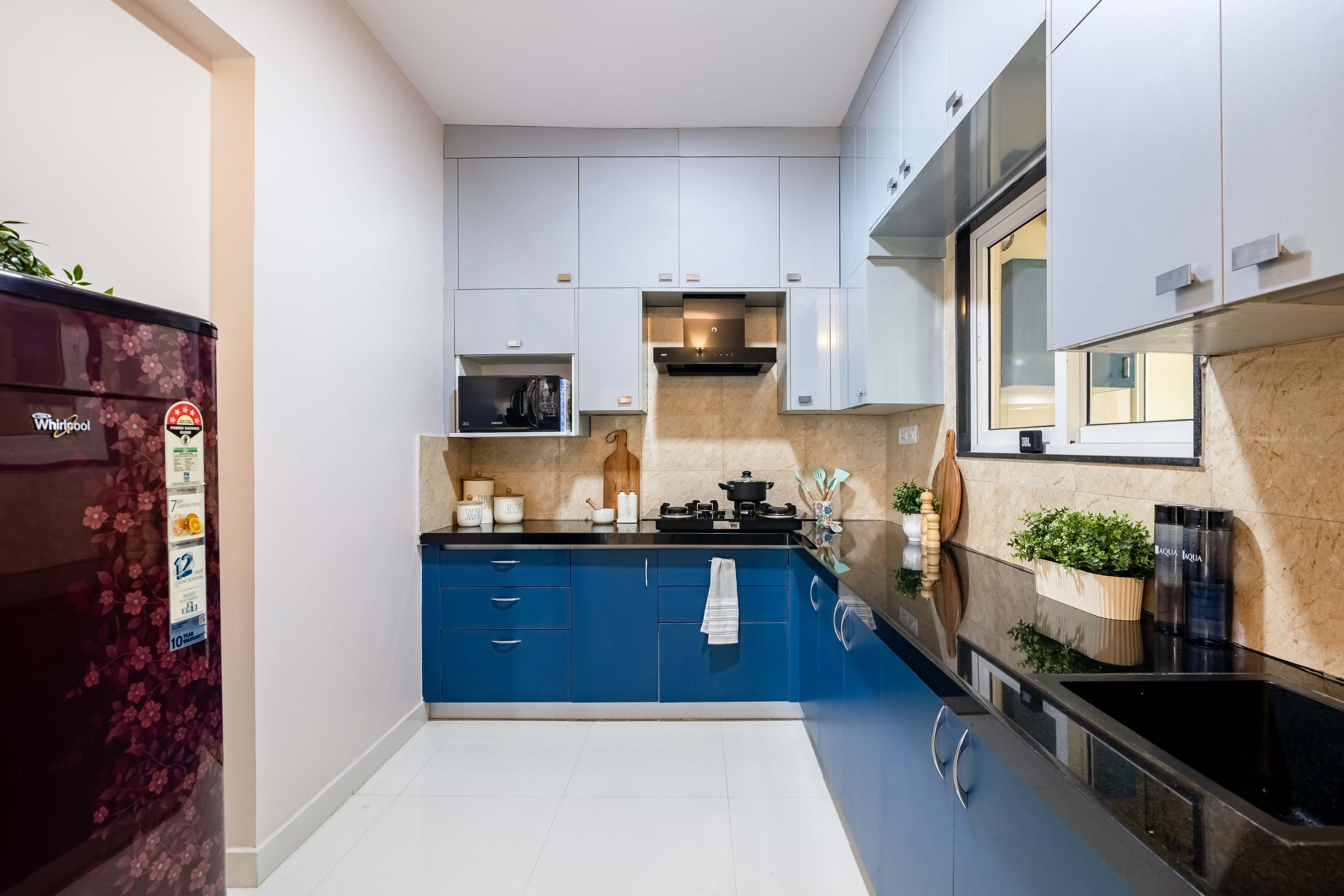 Modern Kitchen Design With A Black Granite Countertop