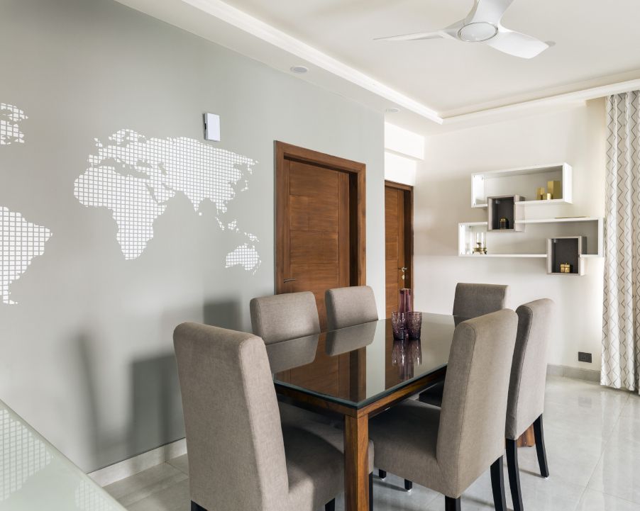 Grey Wall Paint Design With A World Map Stencil Livspace 125 5 1674544924 OtOE7