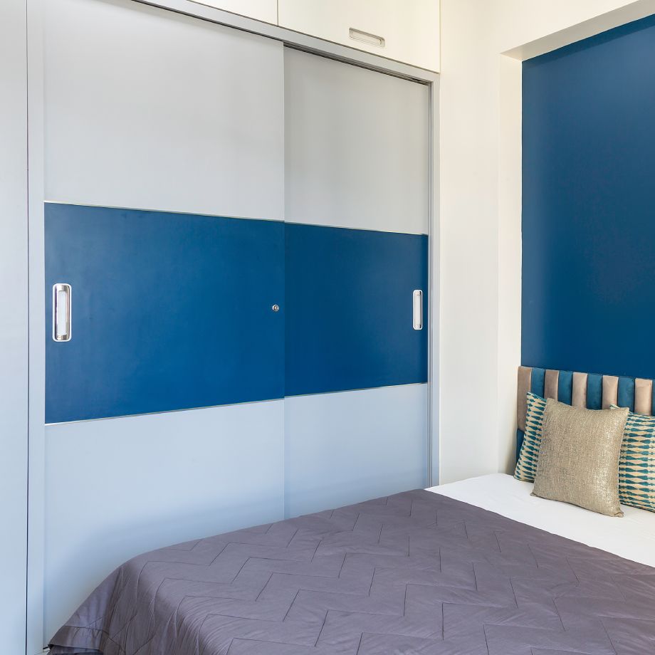 Contemporary Blue And Grey Sliding Door Wardrobe Design