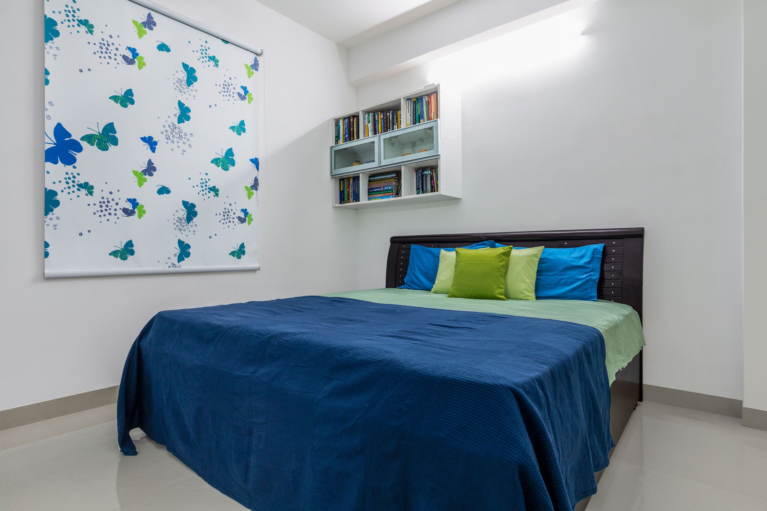 Modern Guest Room Design With 2-Door Blue Sliding Wardrobe With Mirror