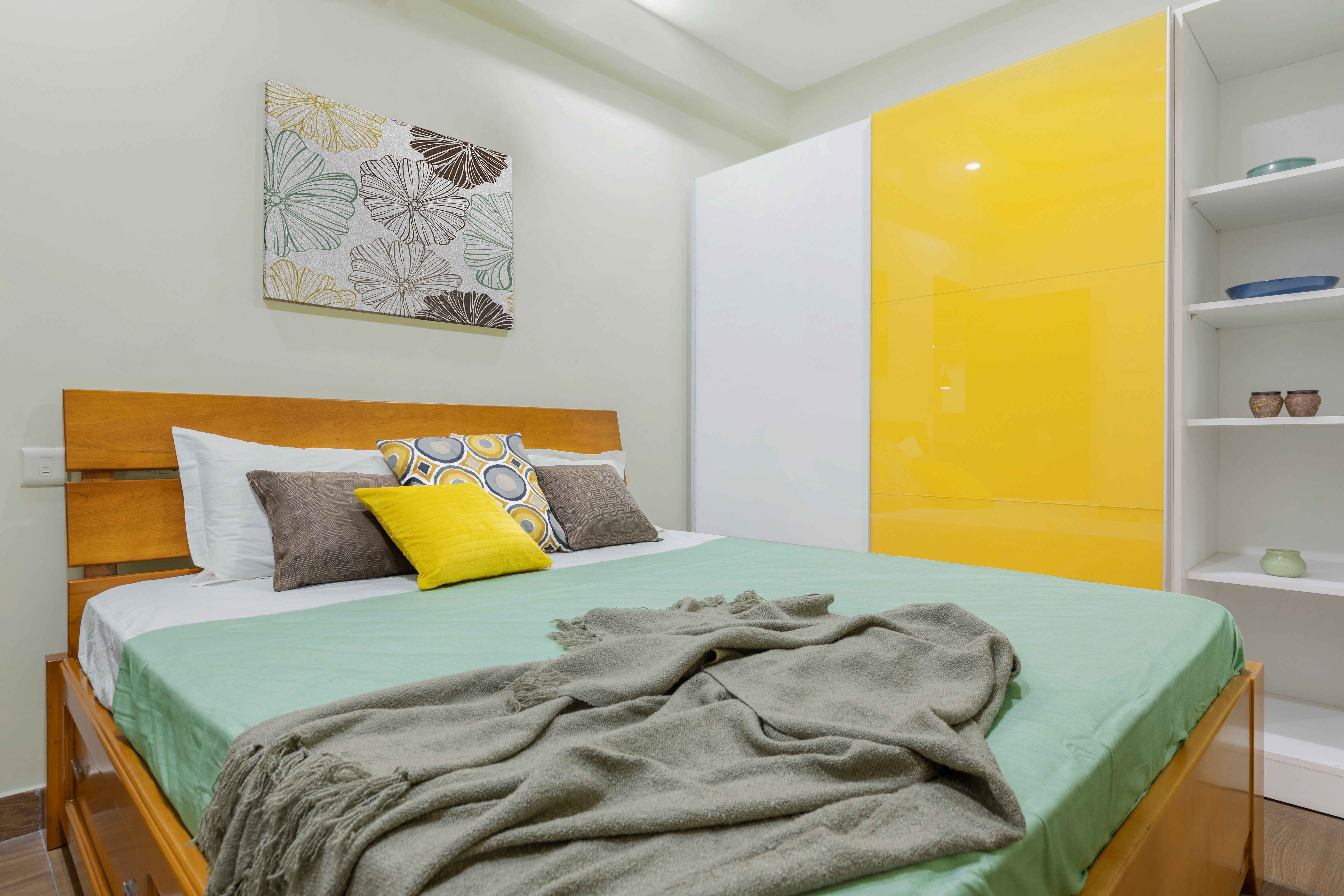 Modern Guest Bedroom Design With White And Yellow Glossy 2-Door Sliding Wardrobe