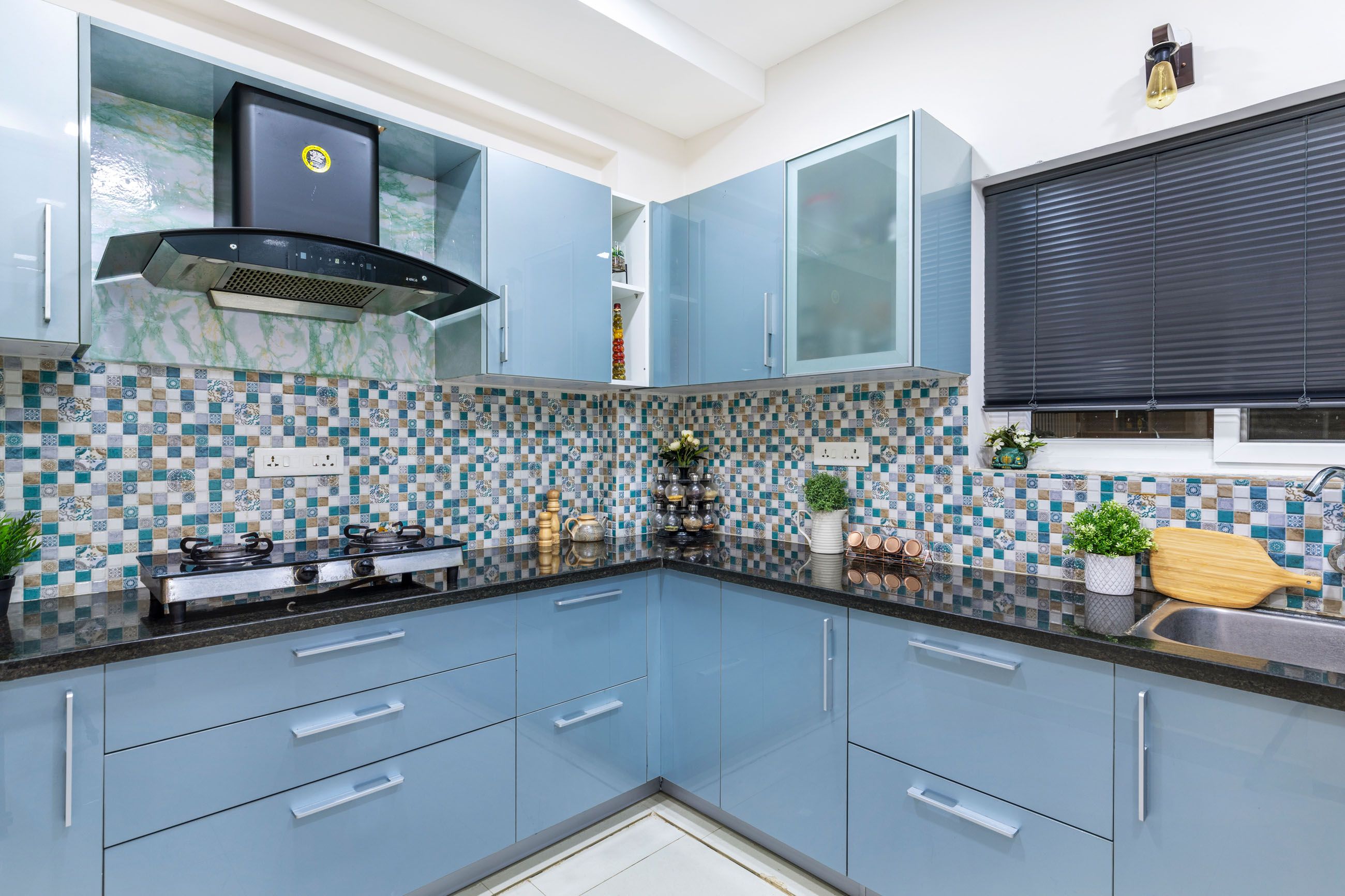 Hyderabad 2-BHK Apartment Interior Design With Blue L-Shape Kitchen ...