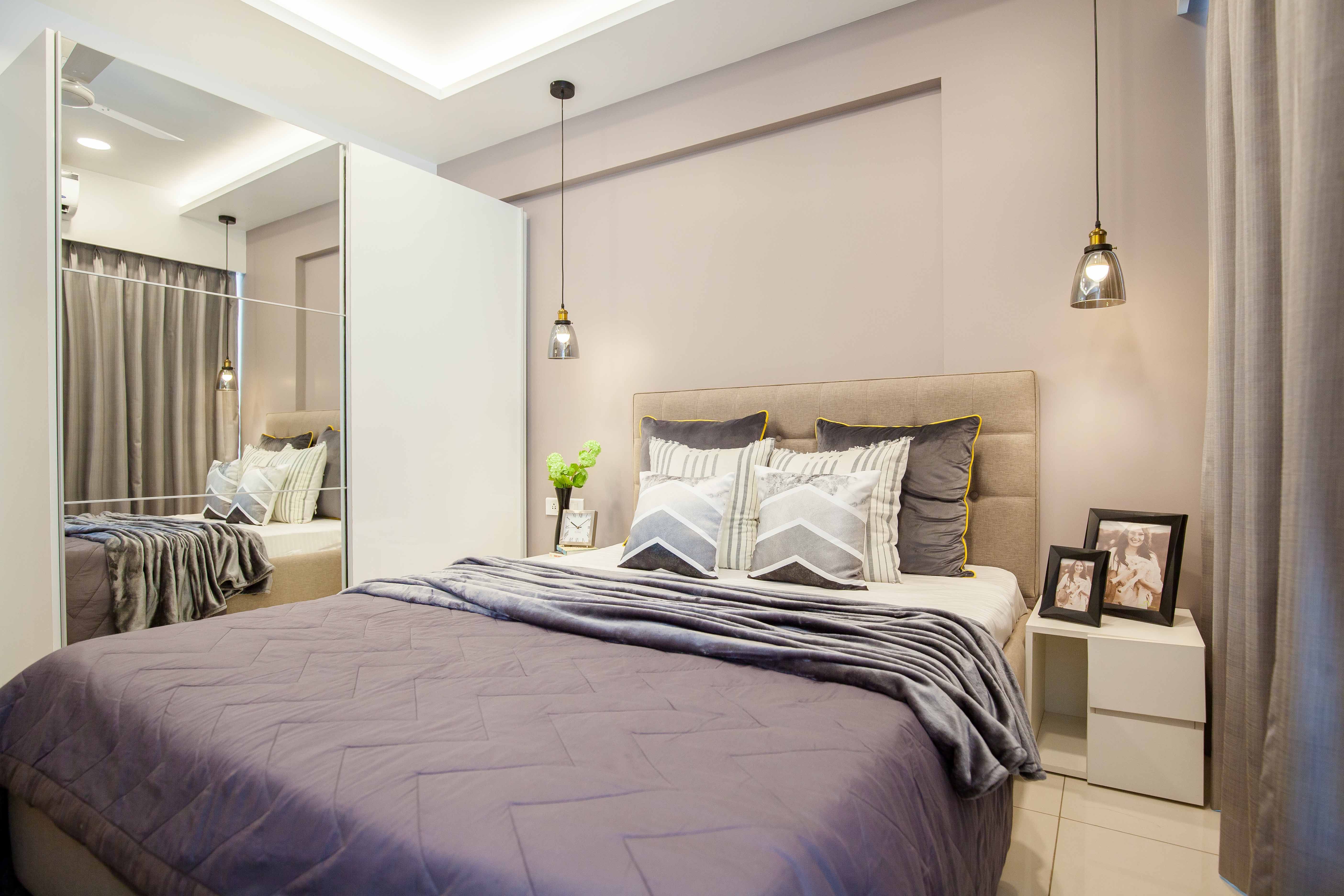 Modern 2-BHK Flat Design In Pune With Lavender And White Guest Room Design