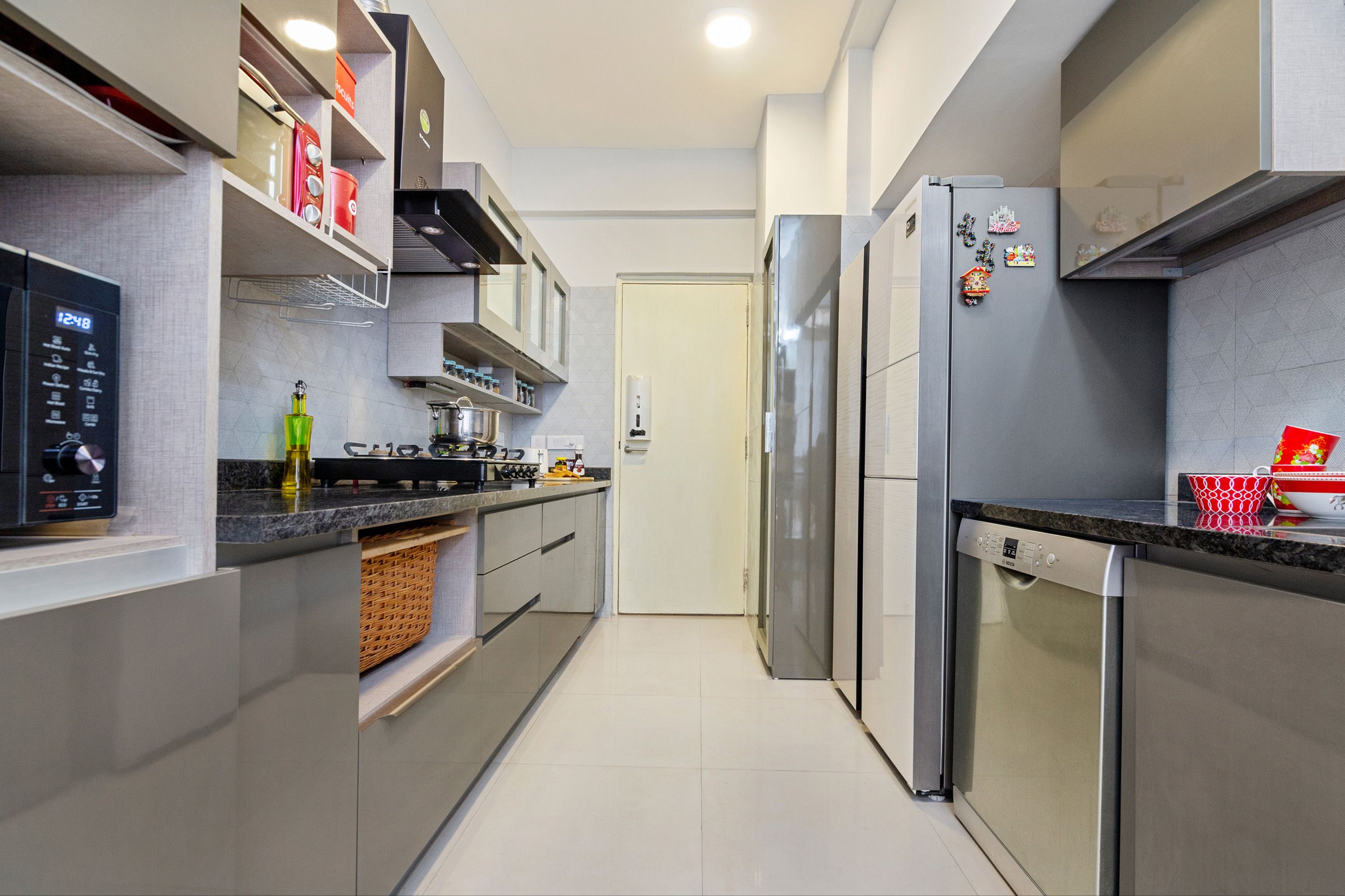 Slate Grey Modern Modular Parallel Kitchen Cabinet Design With Triangular Tile Backsplash In Kitchen
