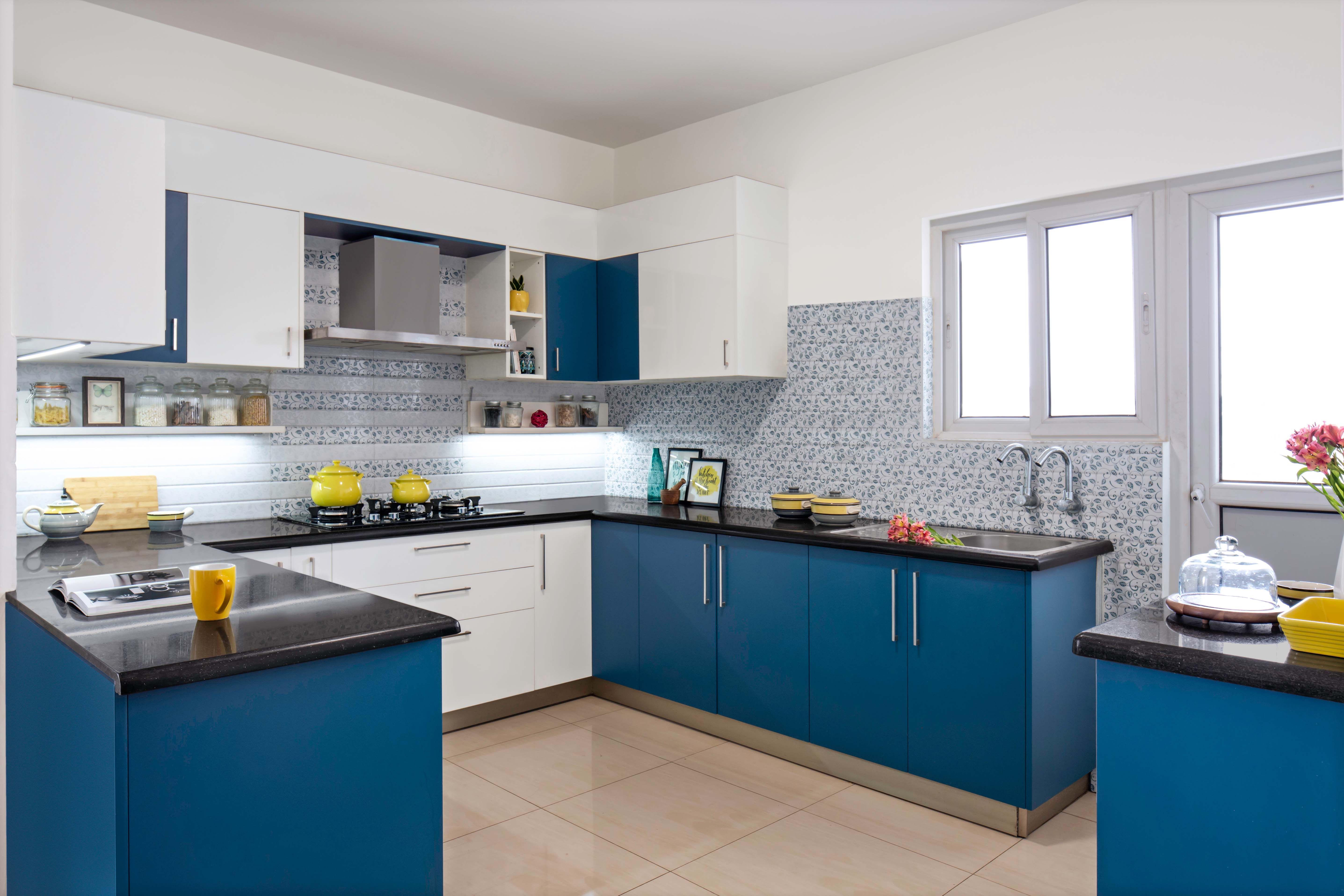 Contemporary Blue And White Modular U-Shaped Kitchen Cabinet Design With Leaf-Patterned Dado Tiles